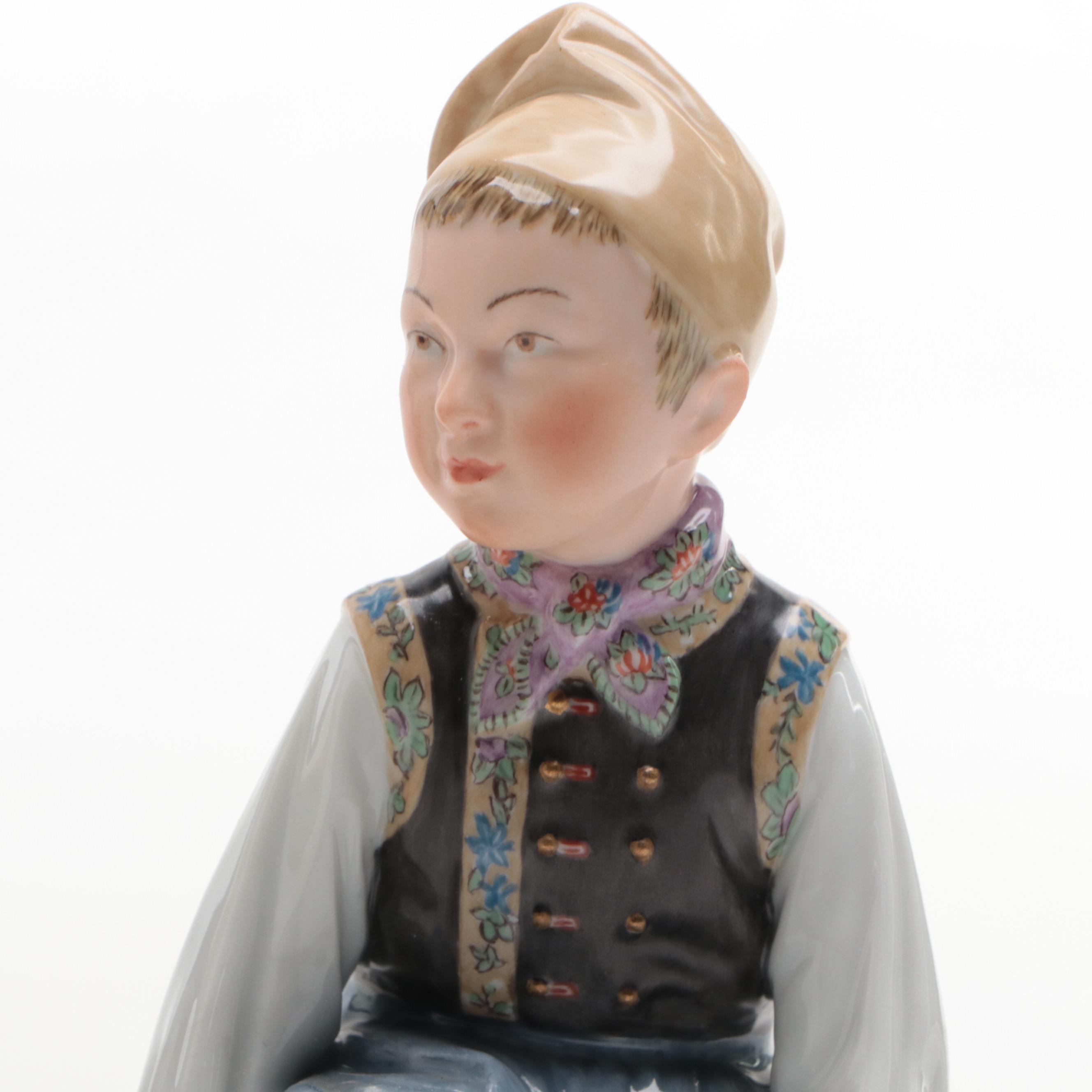 Royal Copenhagen Porcelain Amager Boy and Girl Figurines, Early 20th Century