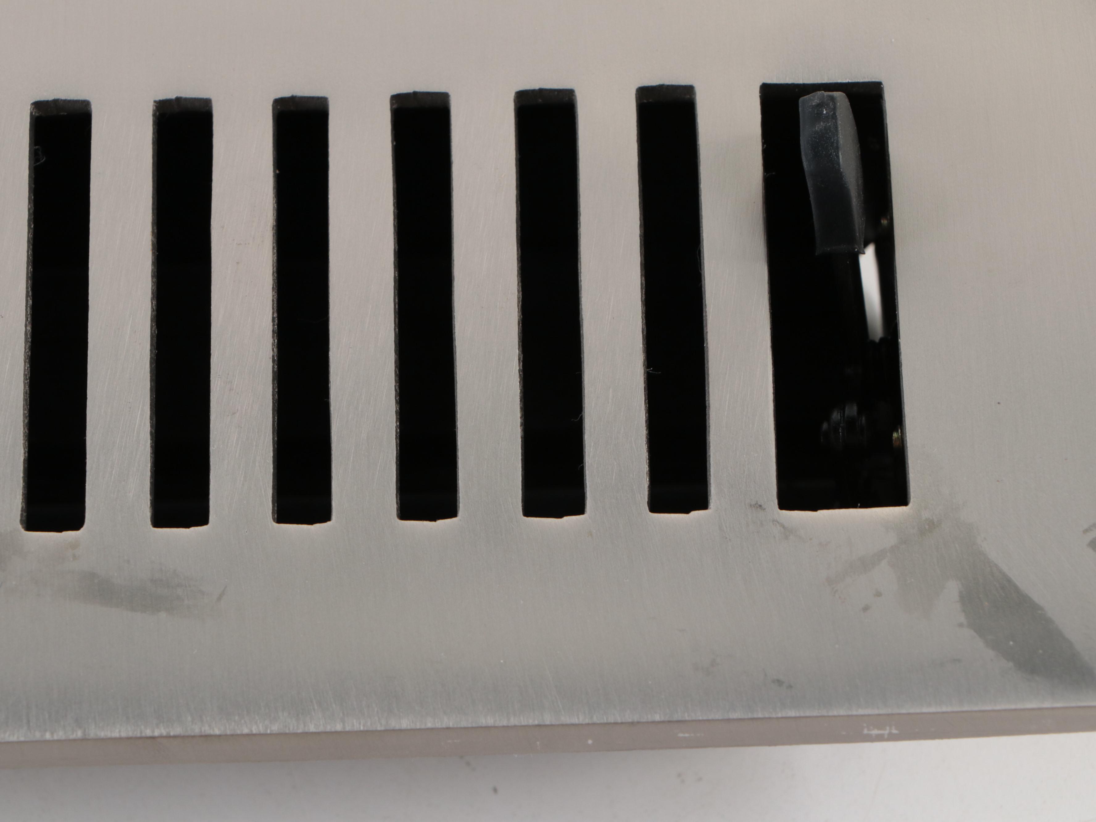 Matte Black and Brushed Nickel Floor Registers