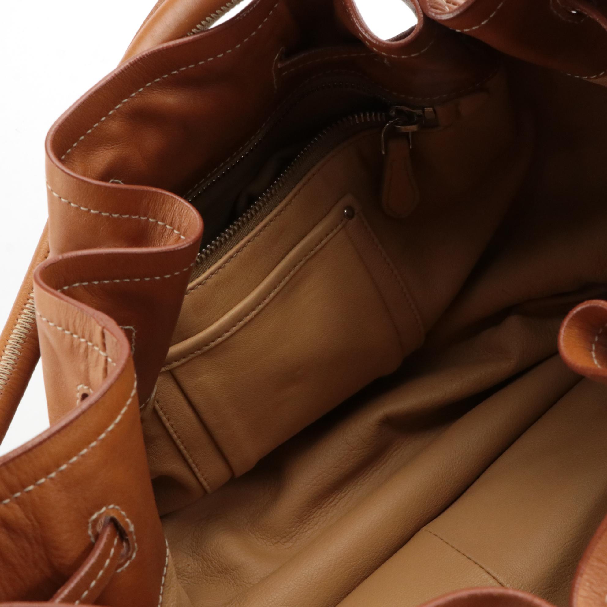 Prada Drawstring Tassel Bucket Bag in Brown Calfskin Leather