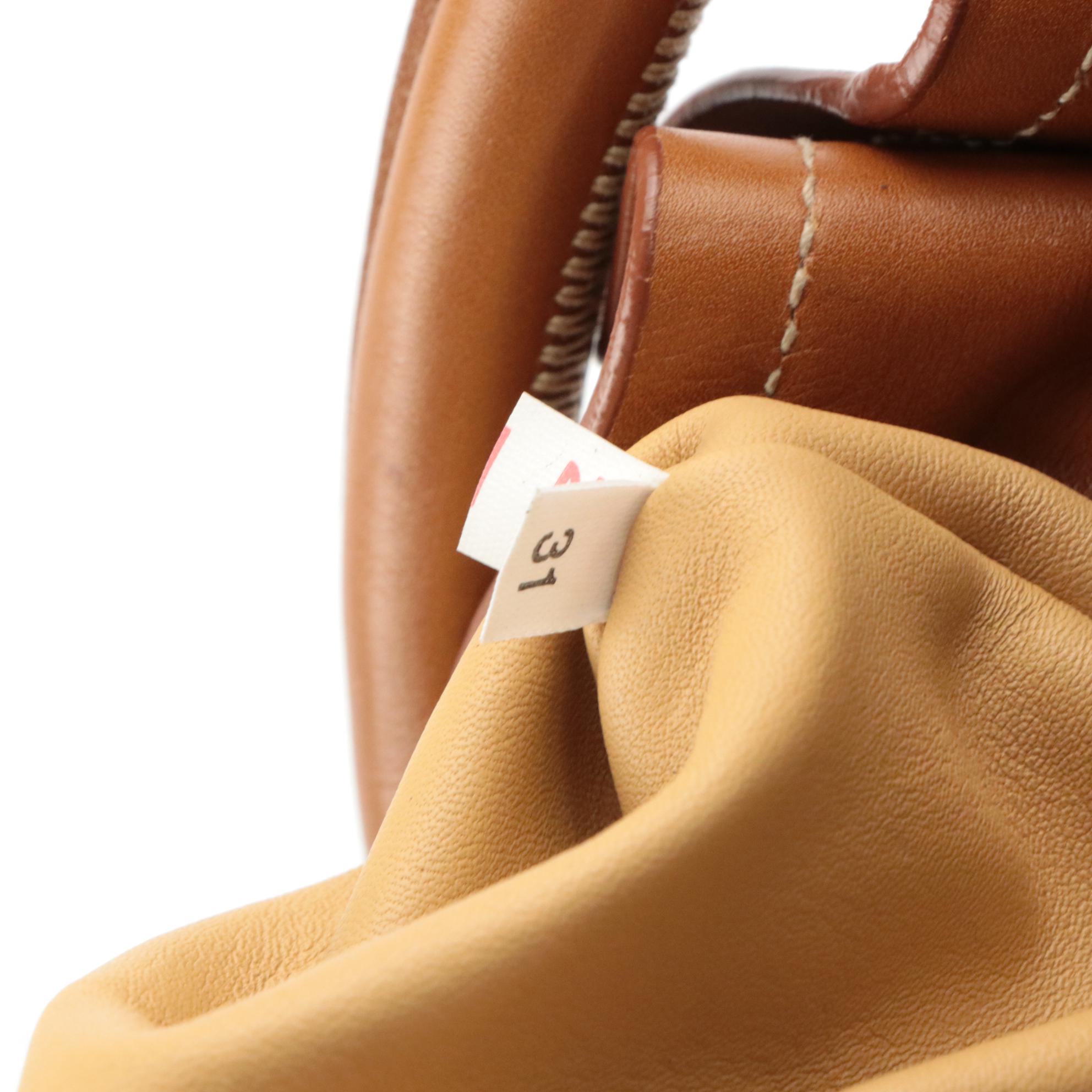 Prada Drawstring Tassel Bucket Bag in Brown Calfskin Leather