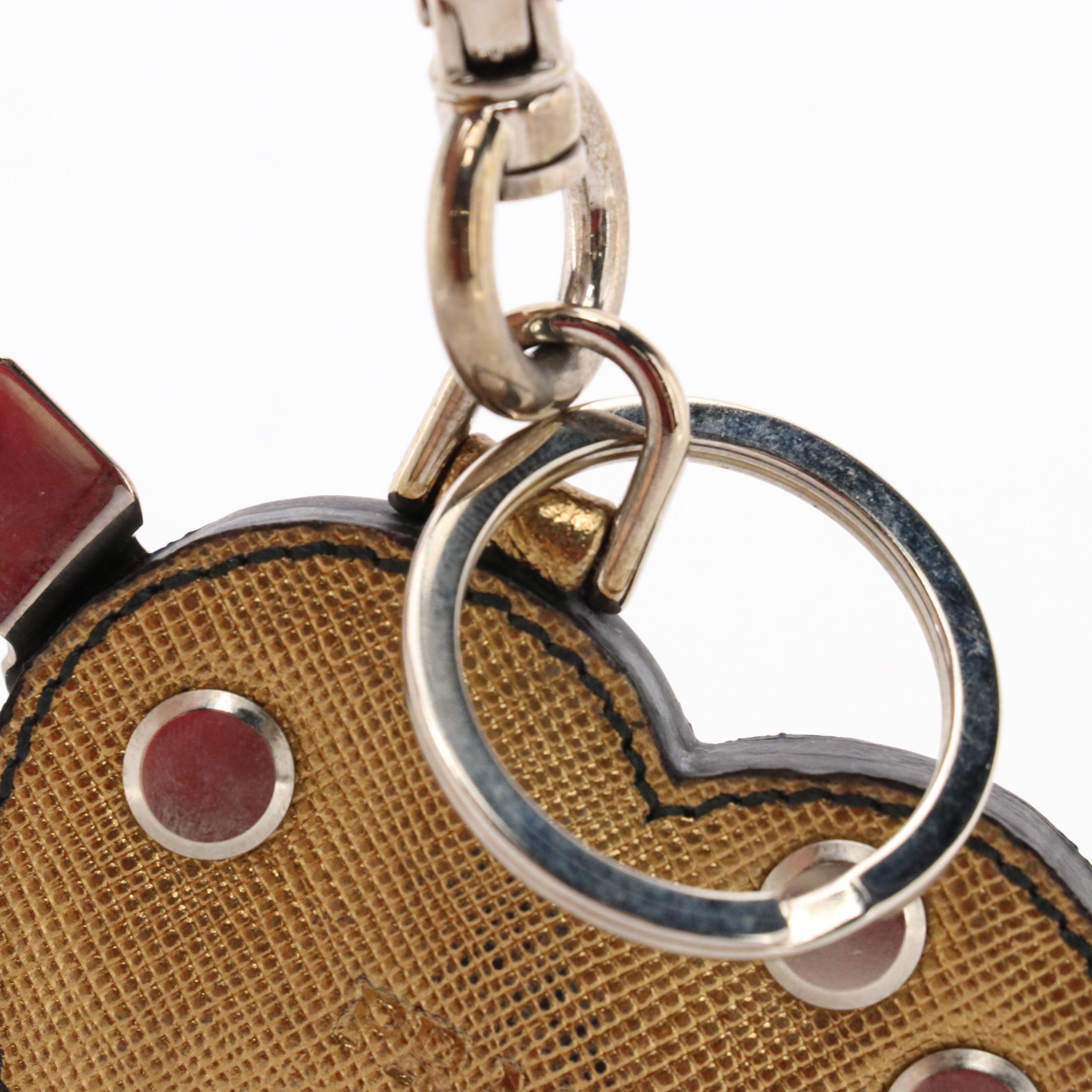 Prada Trick Heart Charm/Keychain in Studded Metallic Gold Tone Saffiano Leather