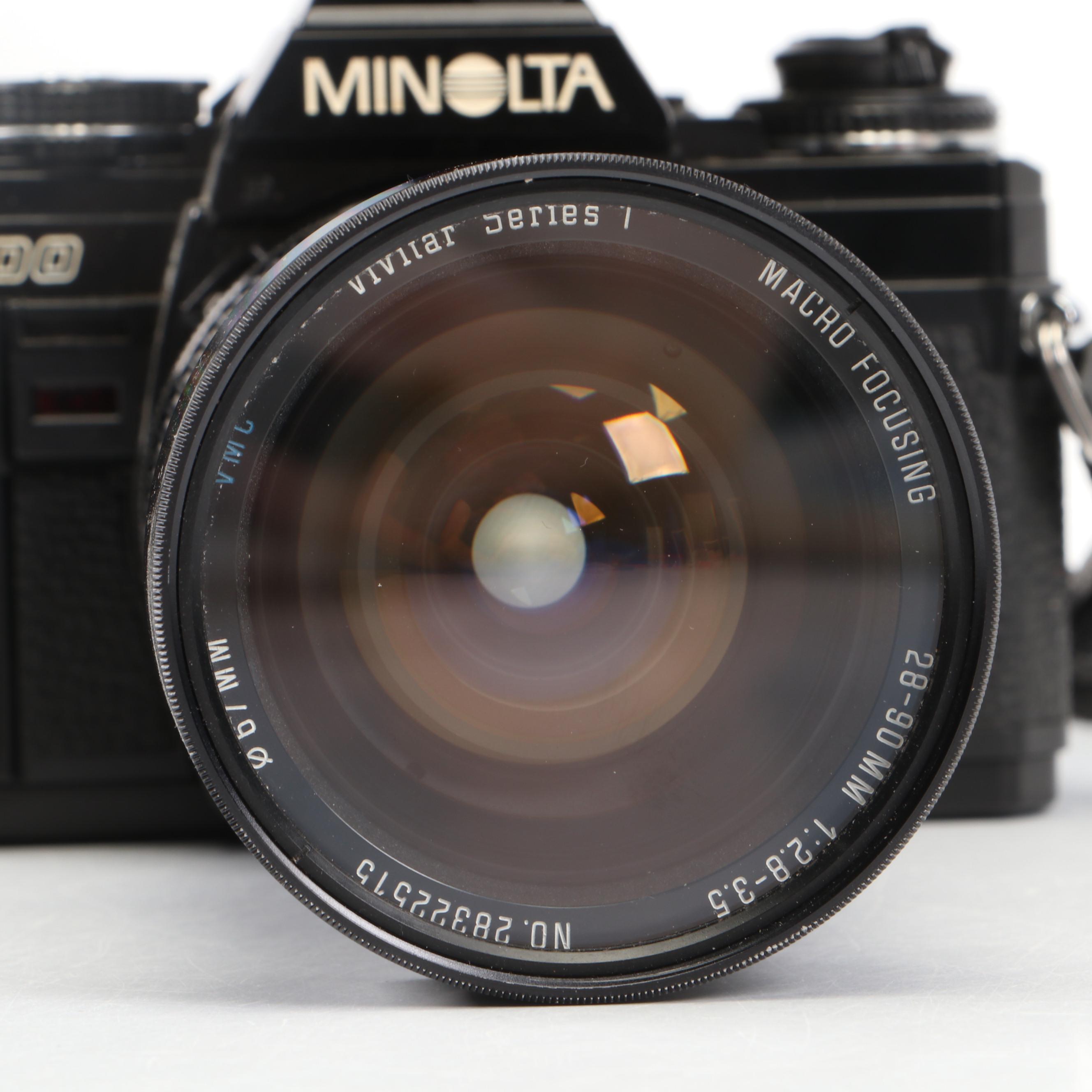 Minolta X-700 Camera and Auto 280PX Flash with More Camera Accessories