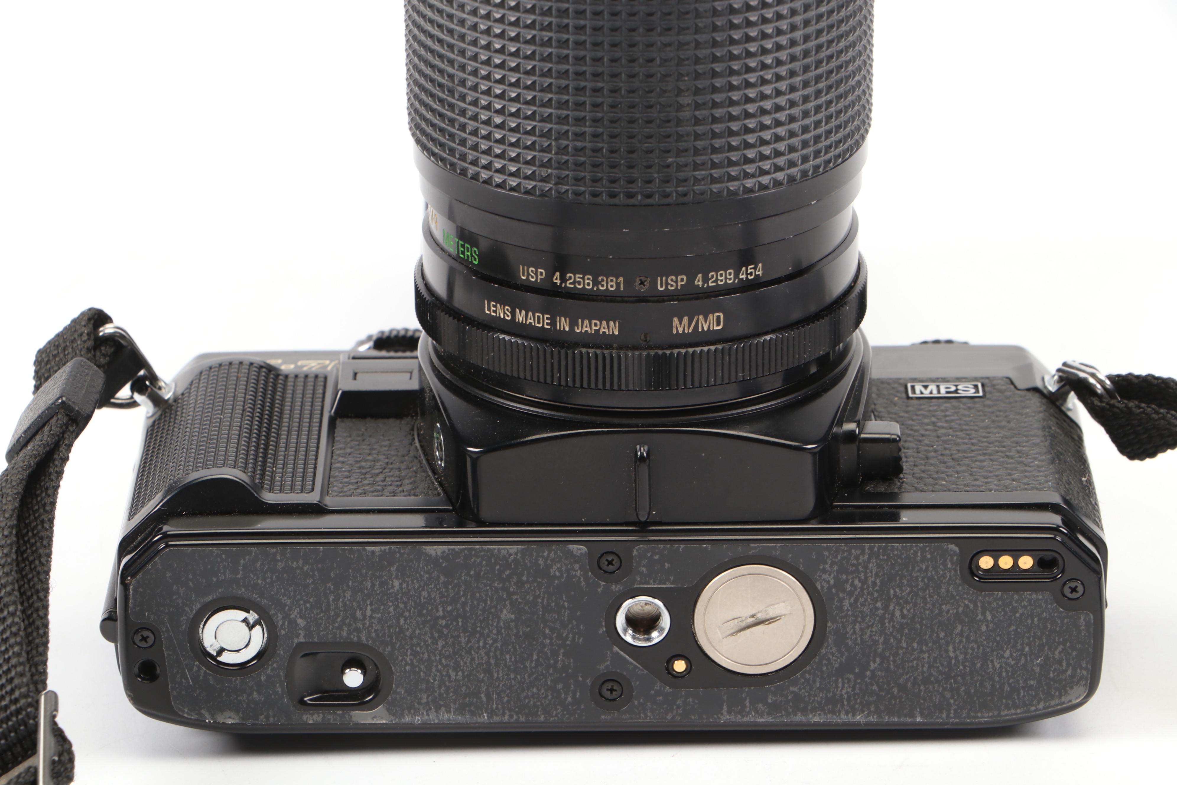 Minolta X-700 Camera and Auto 280PX Flash with More Camera Accessories