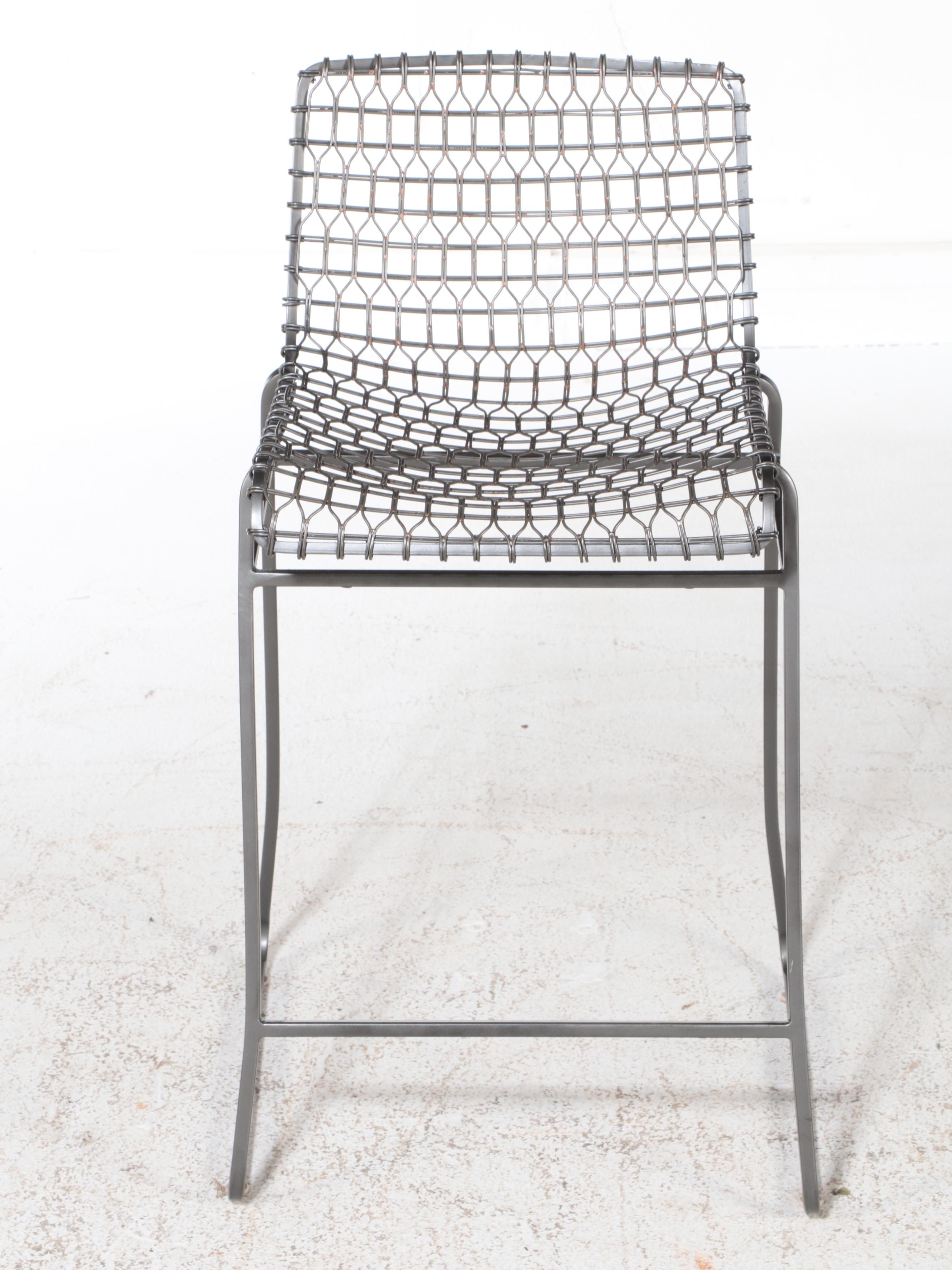 Four Crate & Barrel "Tig Metal" Iron and Brass Counter Stools