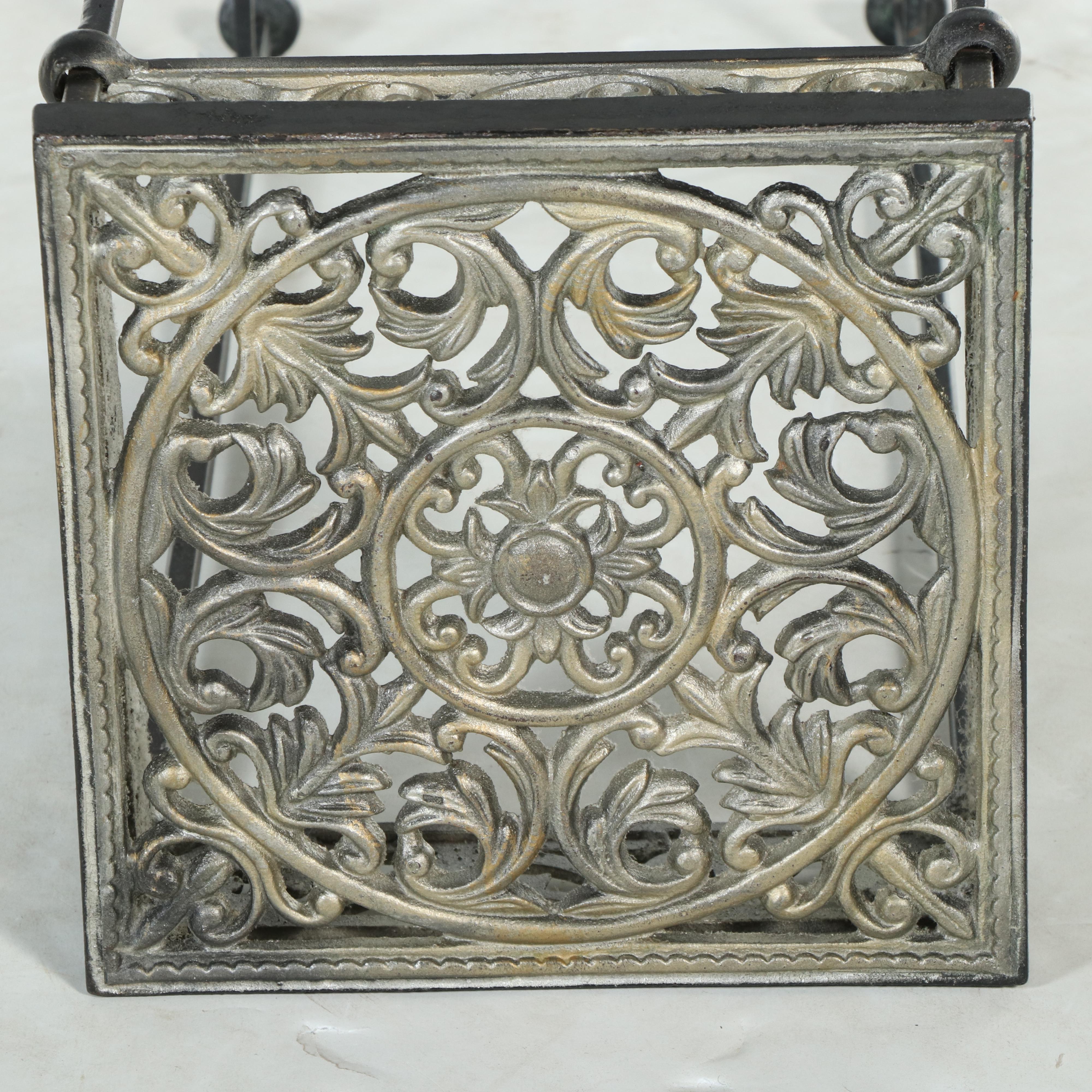 Patinated and Cast Metal Plant Stand with Magazine Rack