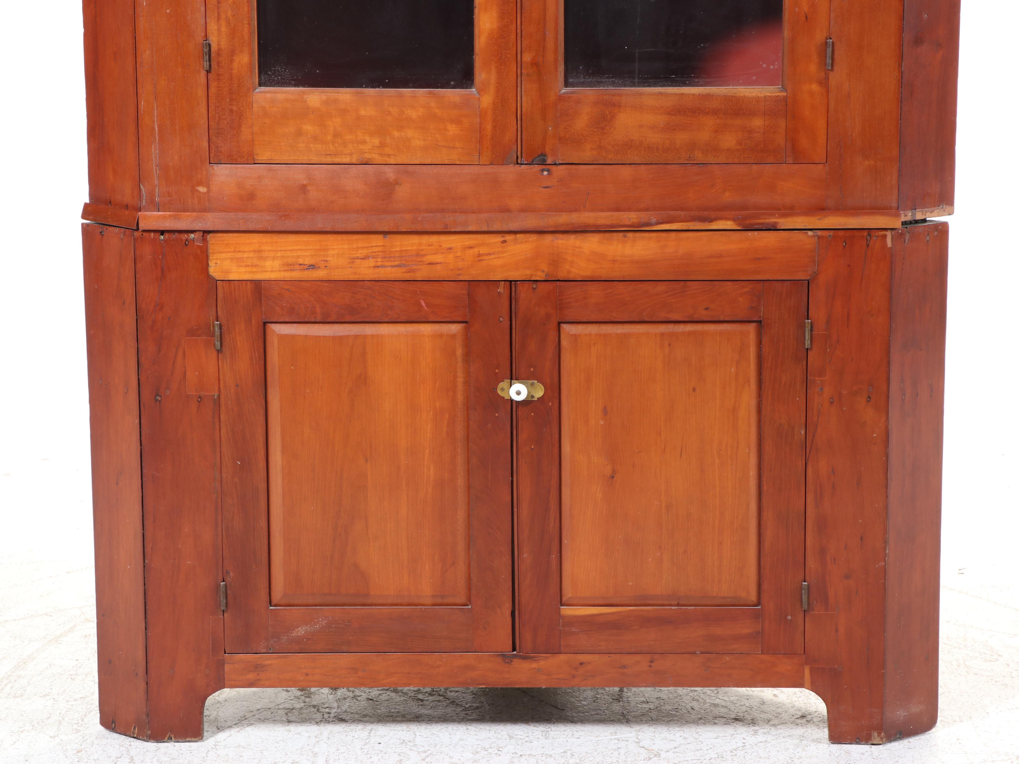 American Primitive Cherrywood and Glazed-Door Corner Cupboard, 19th Century