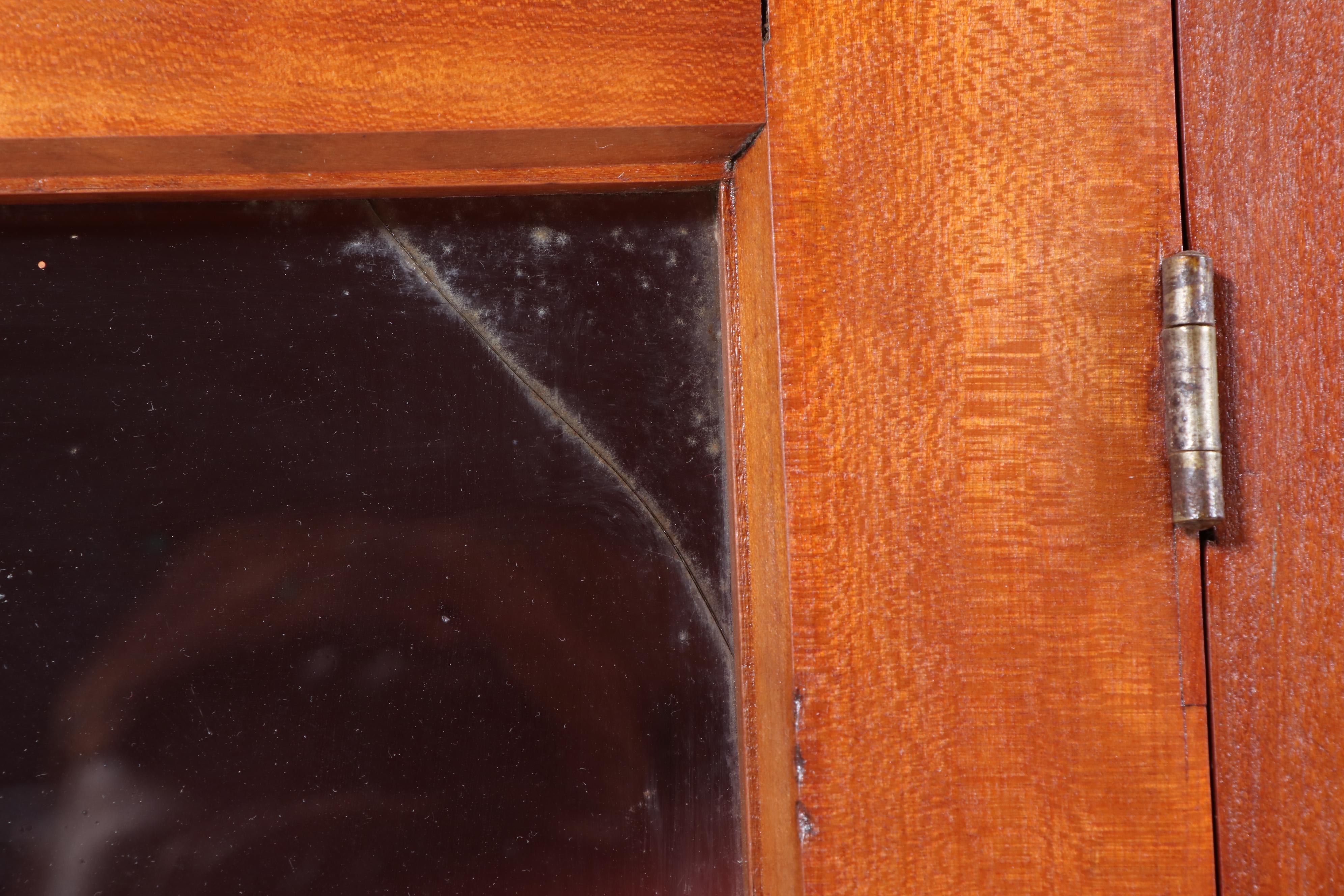 American Primitive Cherrywood and Glazed-Door Corner Cupboard, 19th Century