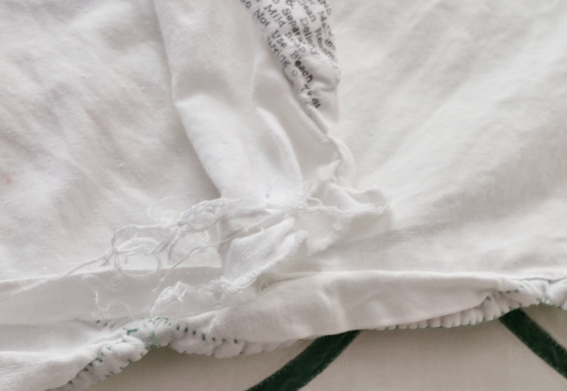 Wrought Iron Queen Bed Frame with Side Table and Floral Appliqué Cotton Bedding