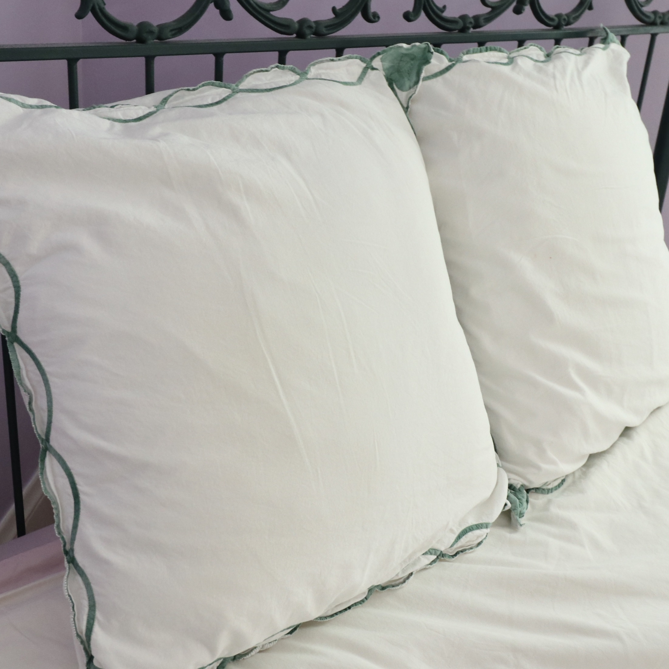 Wrought Iron Queen Bed Frame with Side Table and Floral Appliqué Cotton Bedding