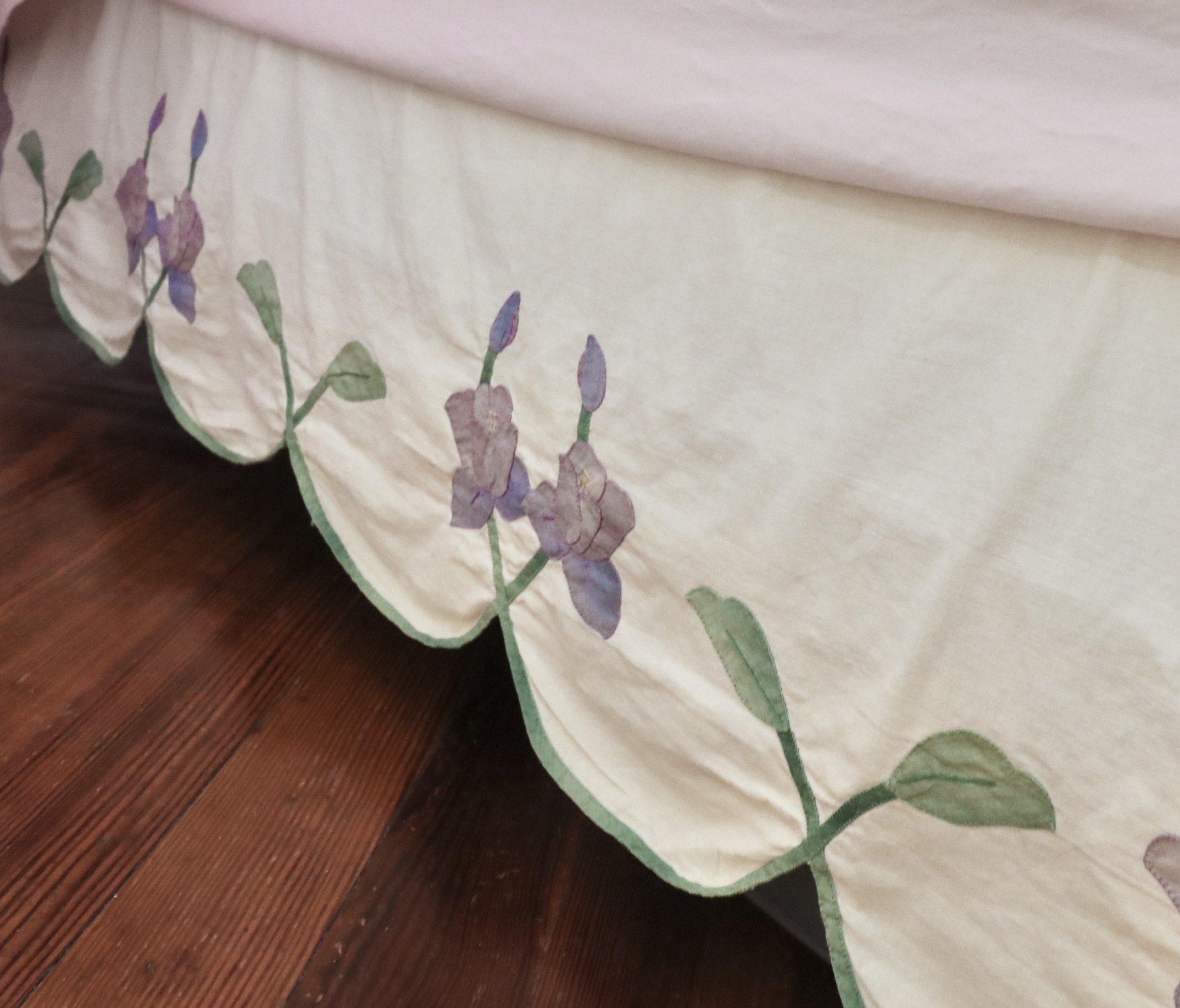 Wrought Iron Queen Bed Frame with Side Table and Floral Appliqué Cotton Bedding