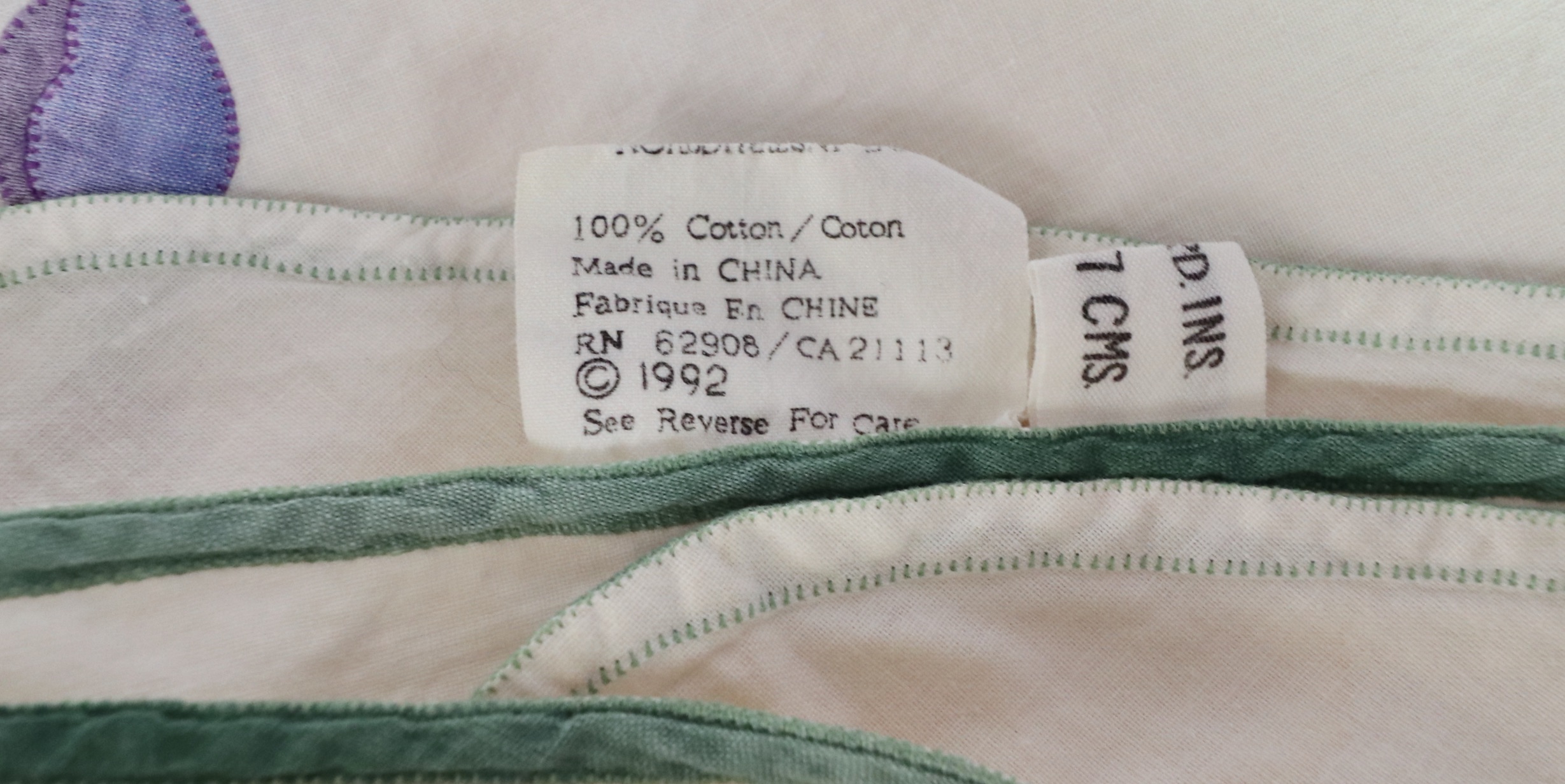 Wrought Iron Queen Bed Frame with Side Table and Floral Appliqué Cotton Bedding