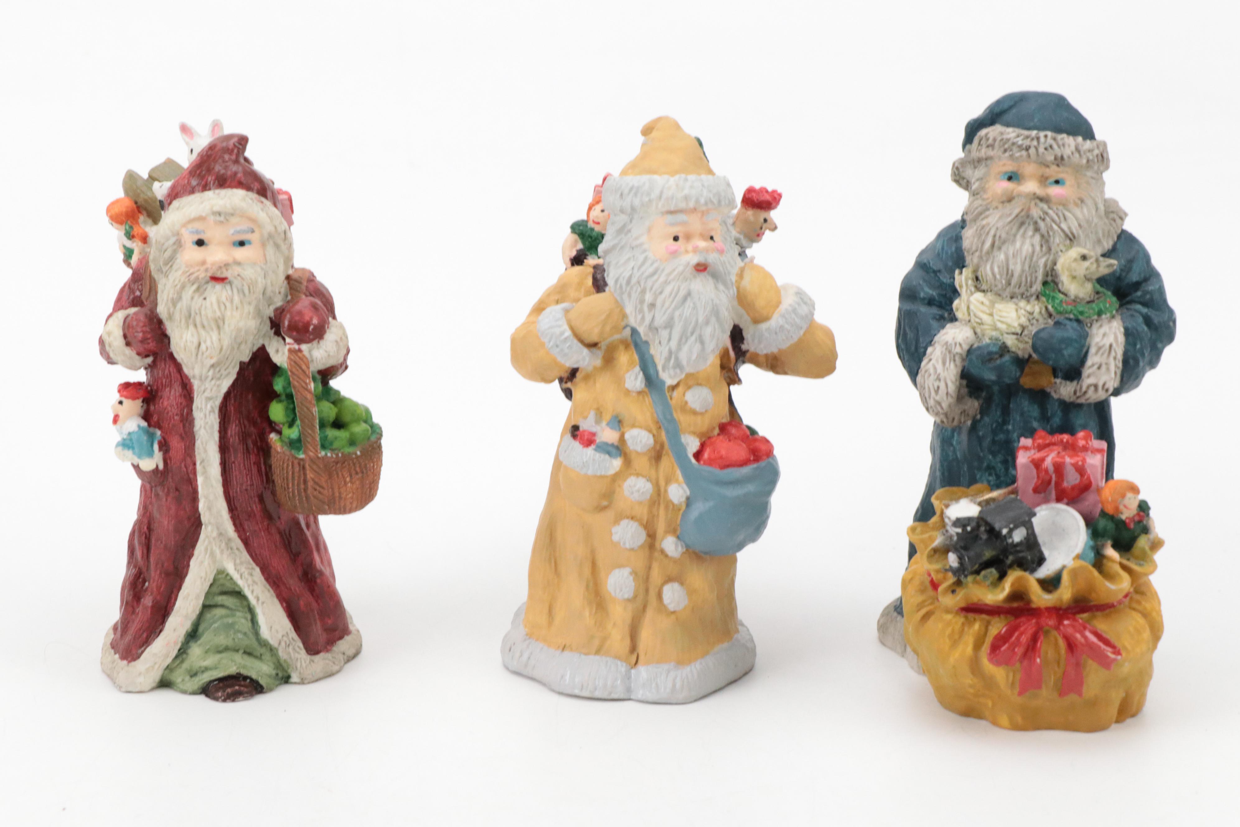 Resin Santa Figurines with Porcelain and Resin Christmas Village Figurines