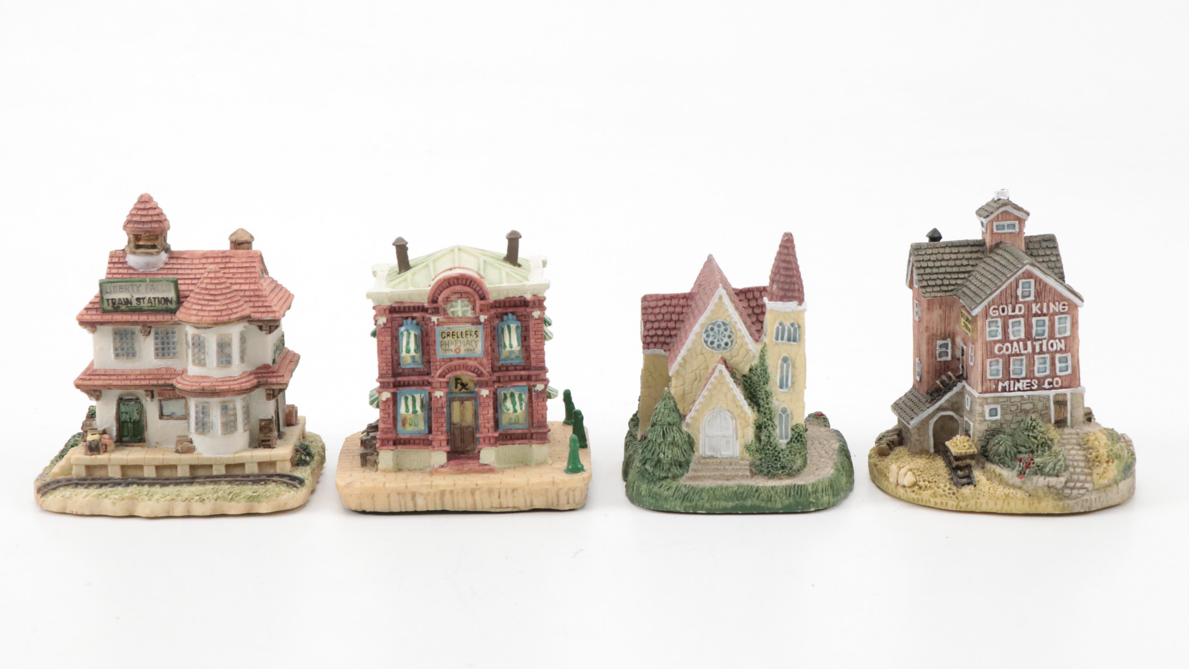 Resin Santa Figurines with Porcelain and Resin Christmas Village Figurines