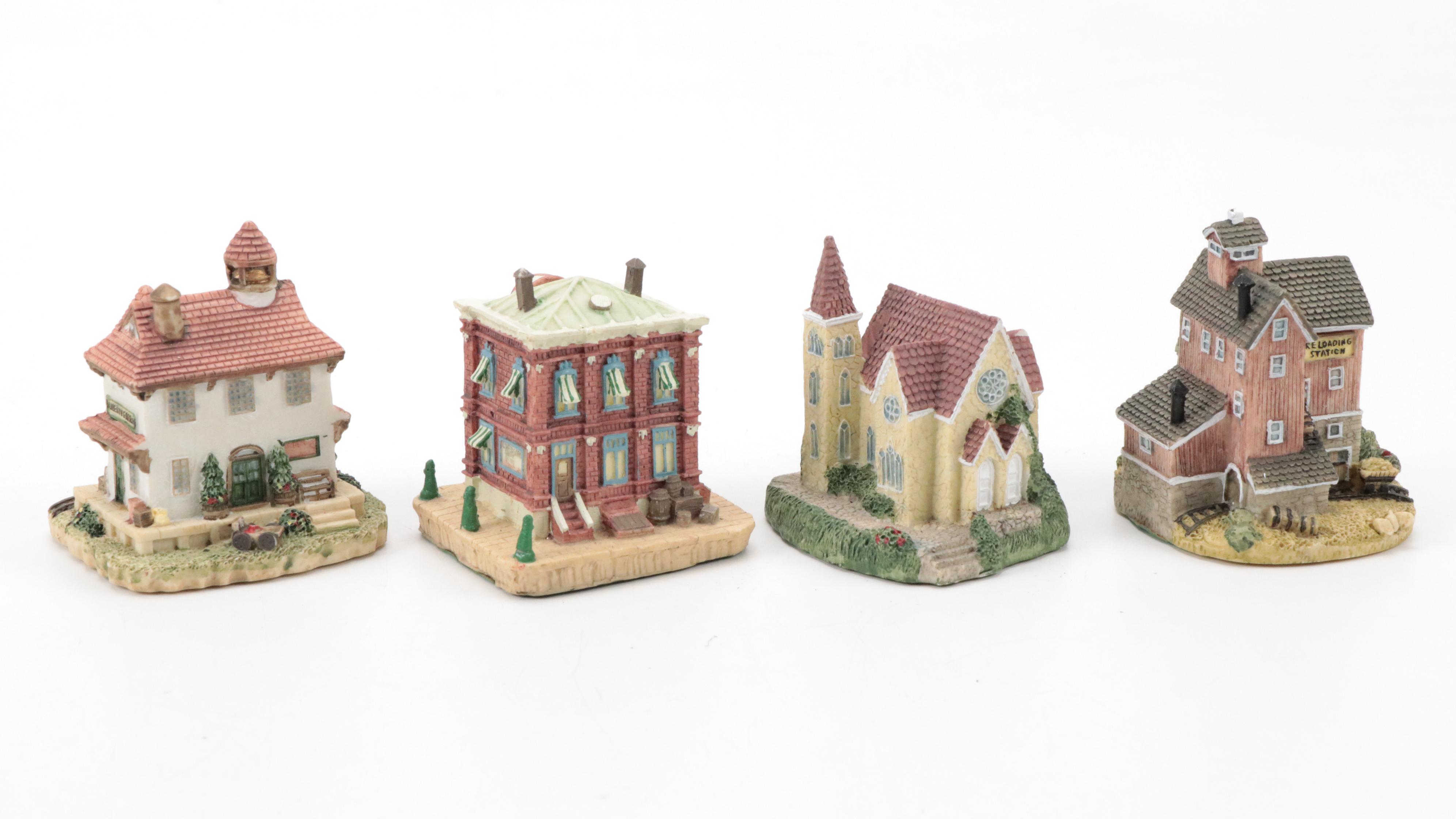 Resin Santa Figurines with Porcelain and Resin Christmas Village Figurines