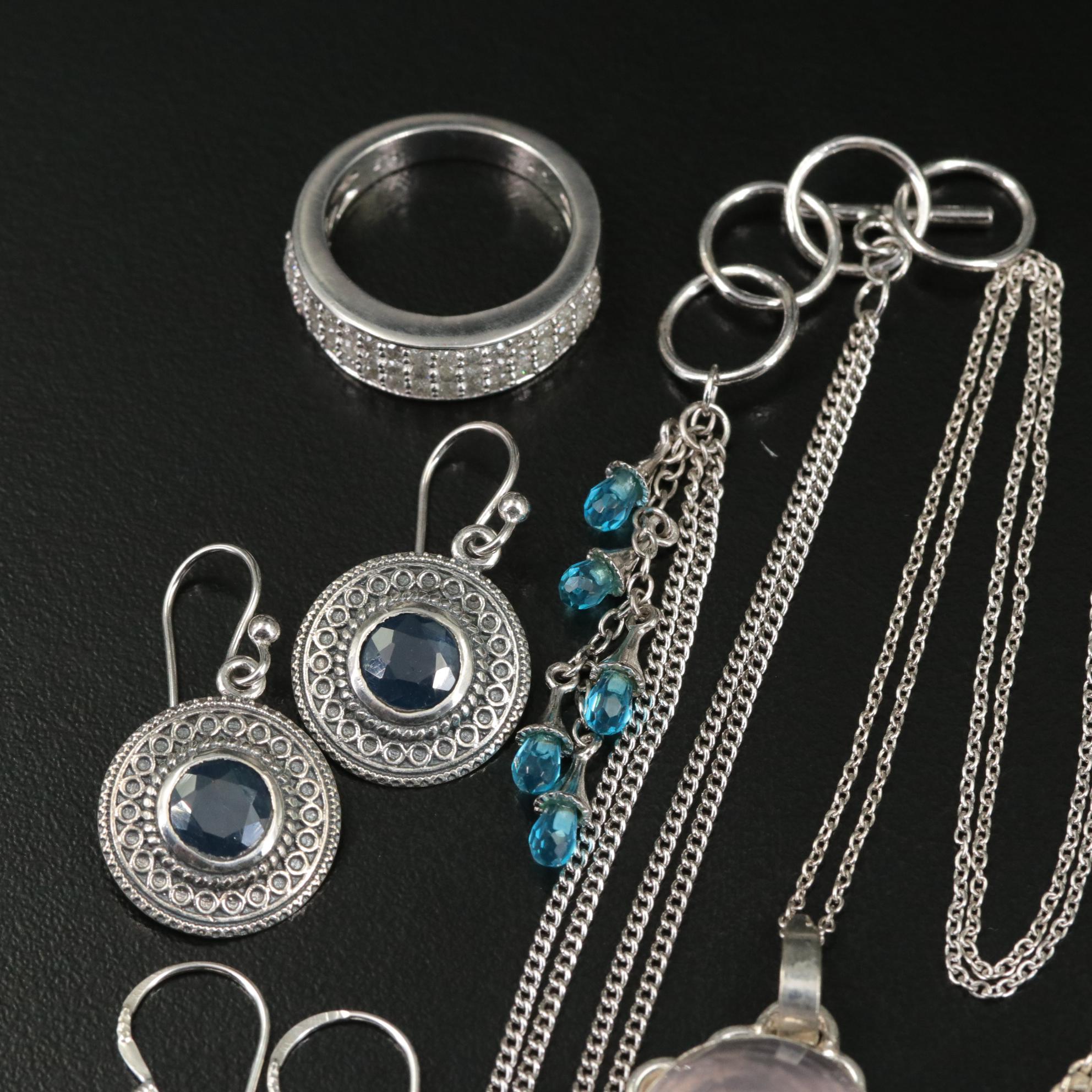 Group of 14 Assorted Sterling Silver Rings, Necklaces, Earrings, and Pendants