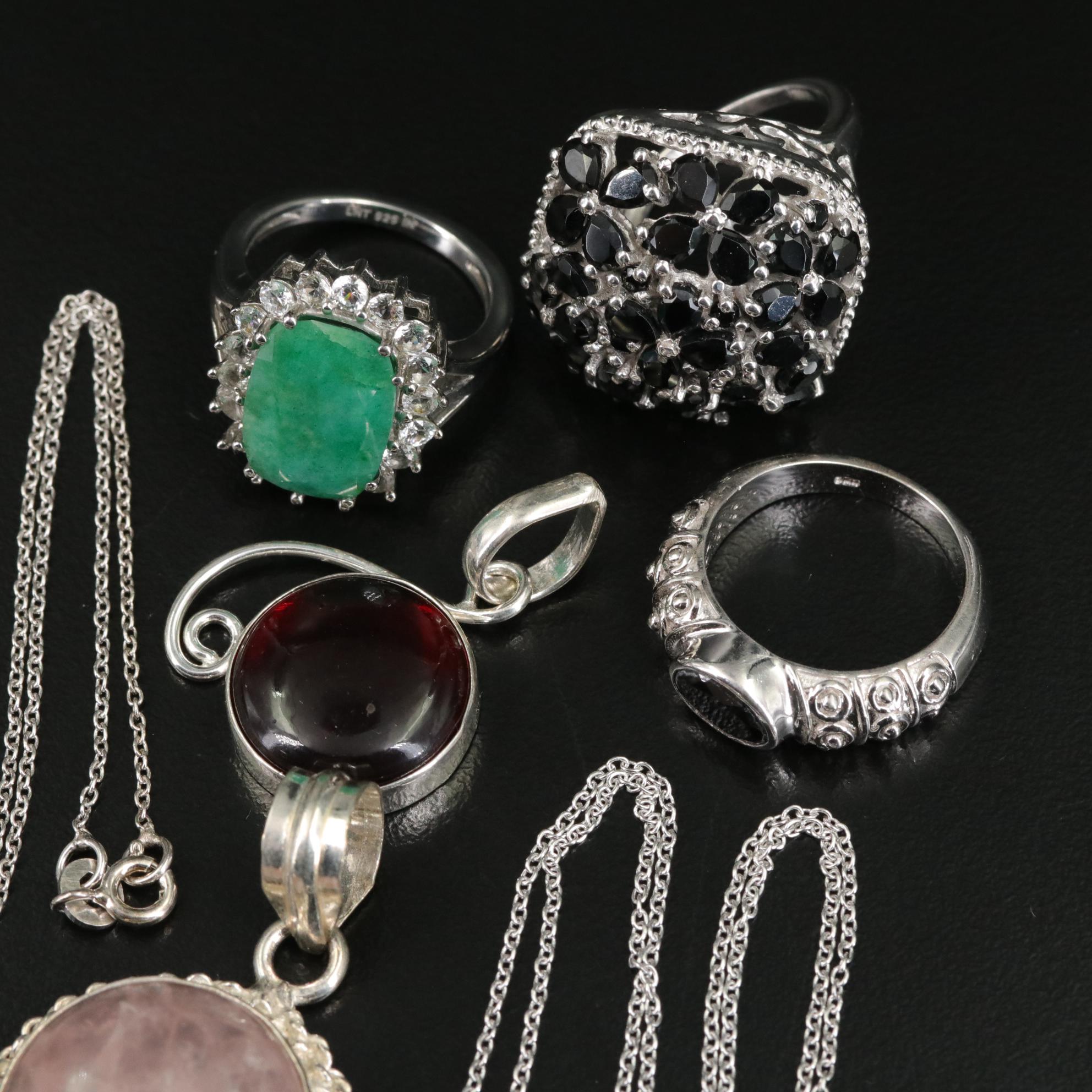 Group of 14 Assorted Sterling Silver Rings, Necklaces, Earrings, and Pendants