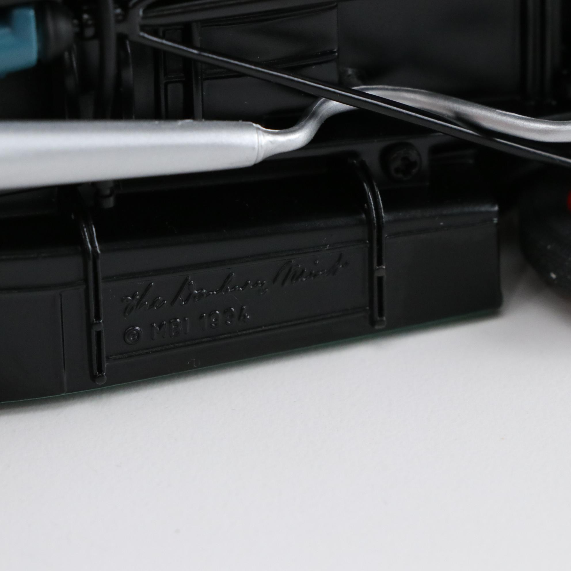 Santa Figurines in Classic Cars, Sleigh and More