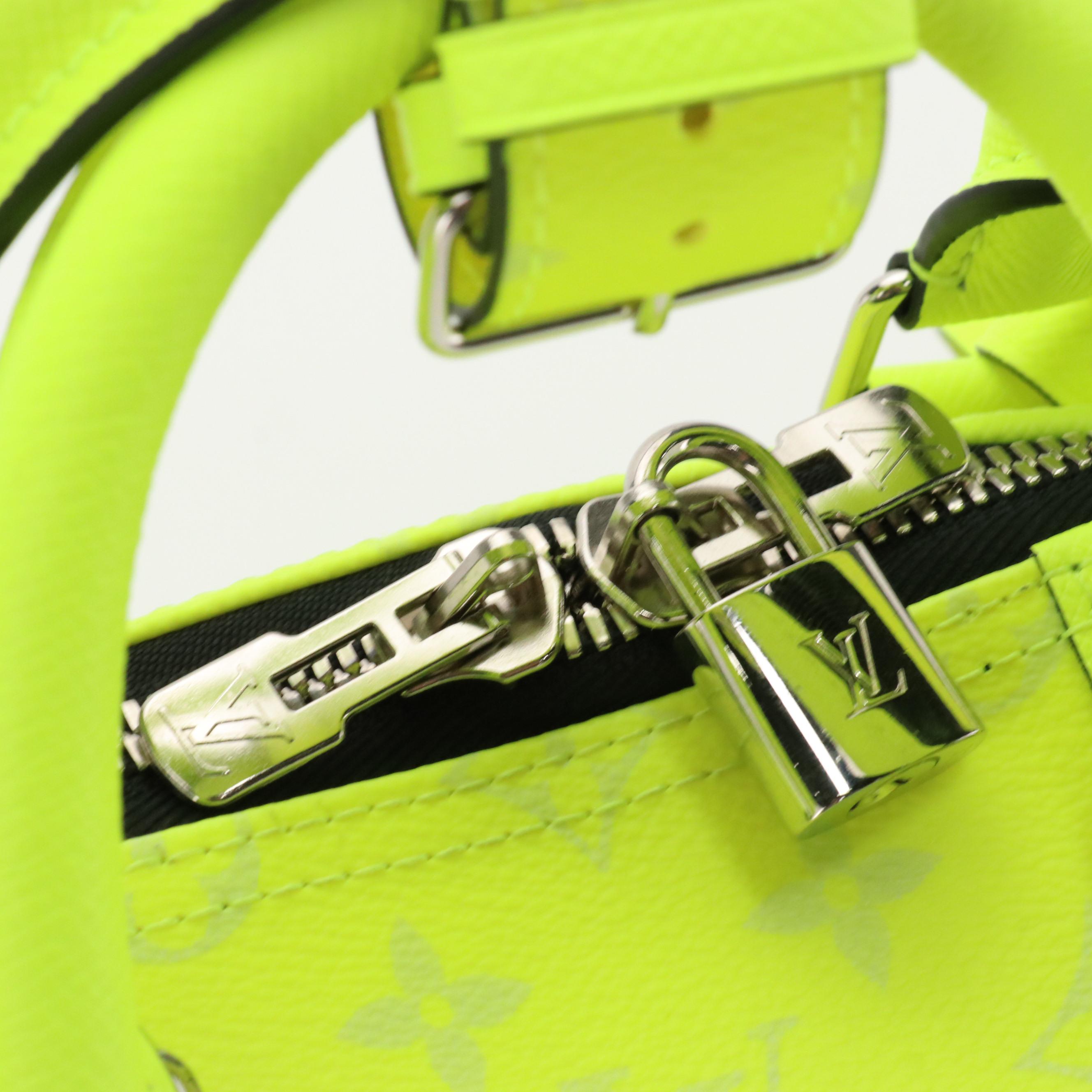 Louis Vuitton Keepall Bandoulière 50 in Neon Taïgarama Leather and Model Kodiak
