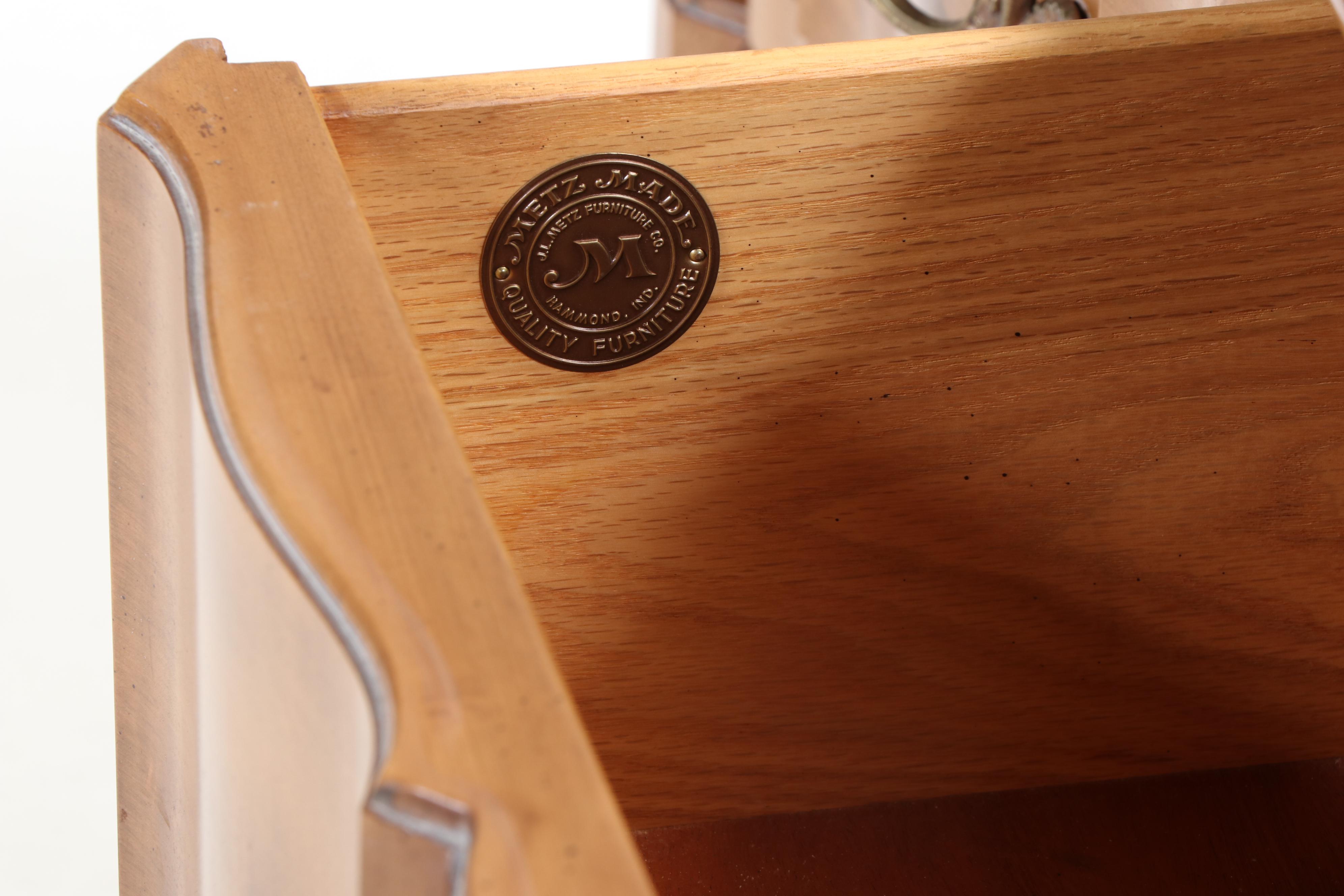 J. L. Metz Furniture Co. French Provincial Style Maple Nine-Drawer Commode