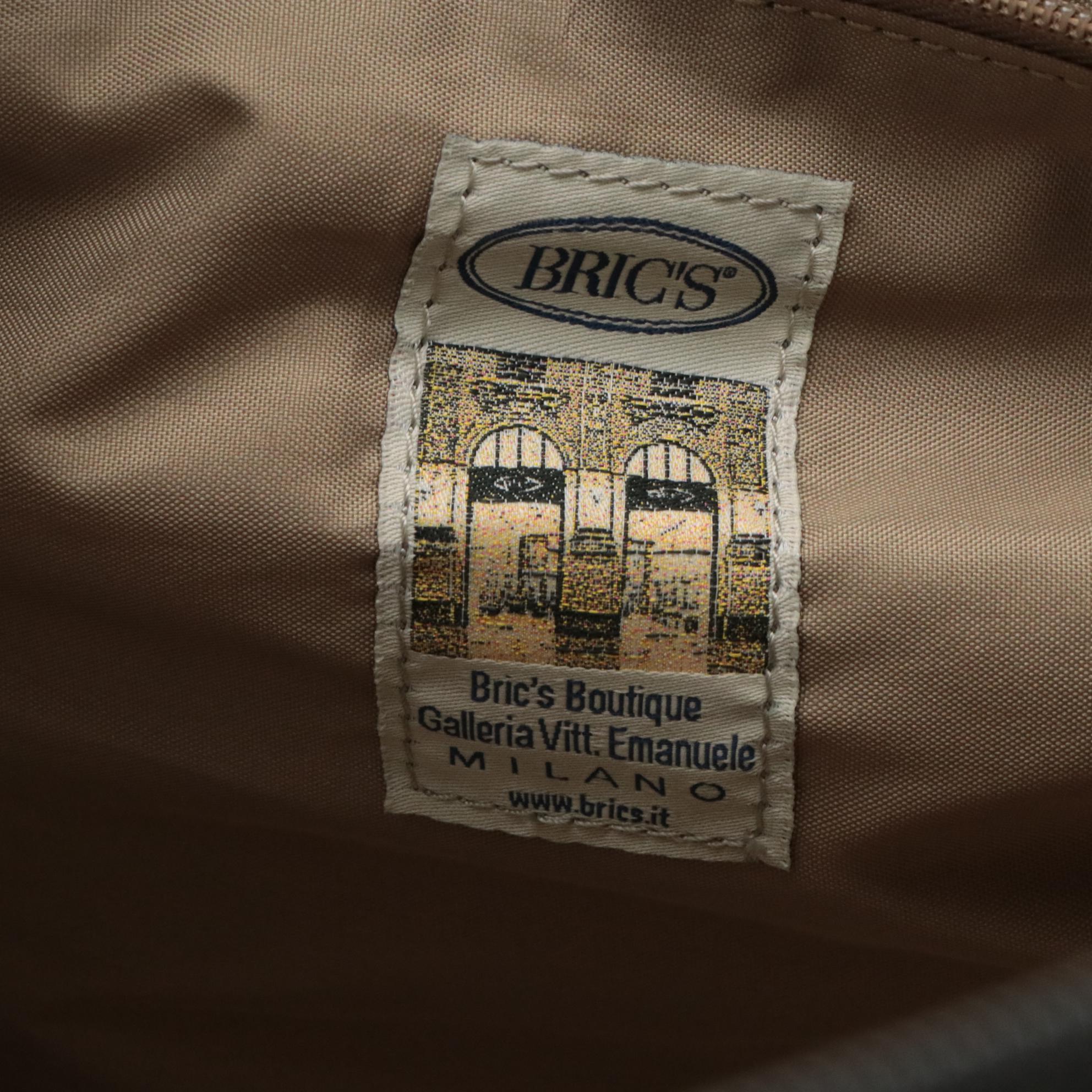 Bric's Black Ballistic Nylon Rolling Duffel Bag with Dark Brown Leather Trim