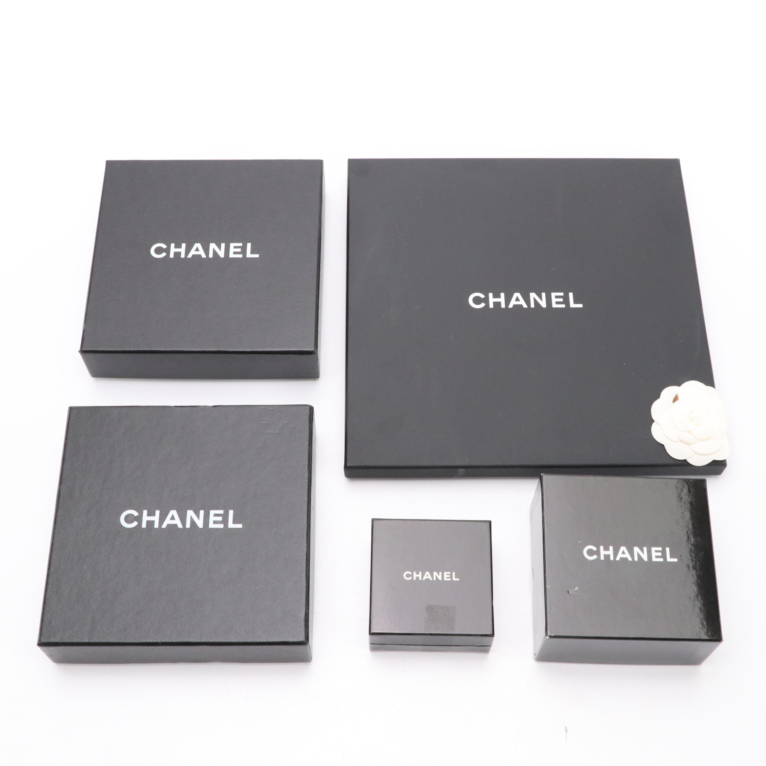 Chanel Retail Boxes & More Designer Dust Bags Featuring Gucci, Dior, Prada, More