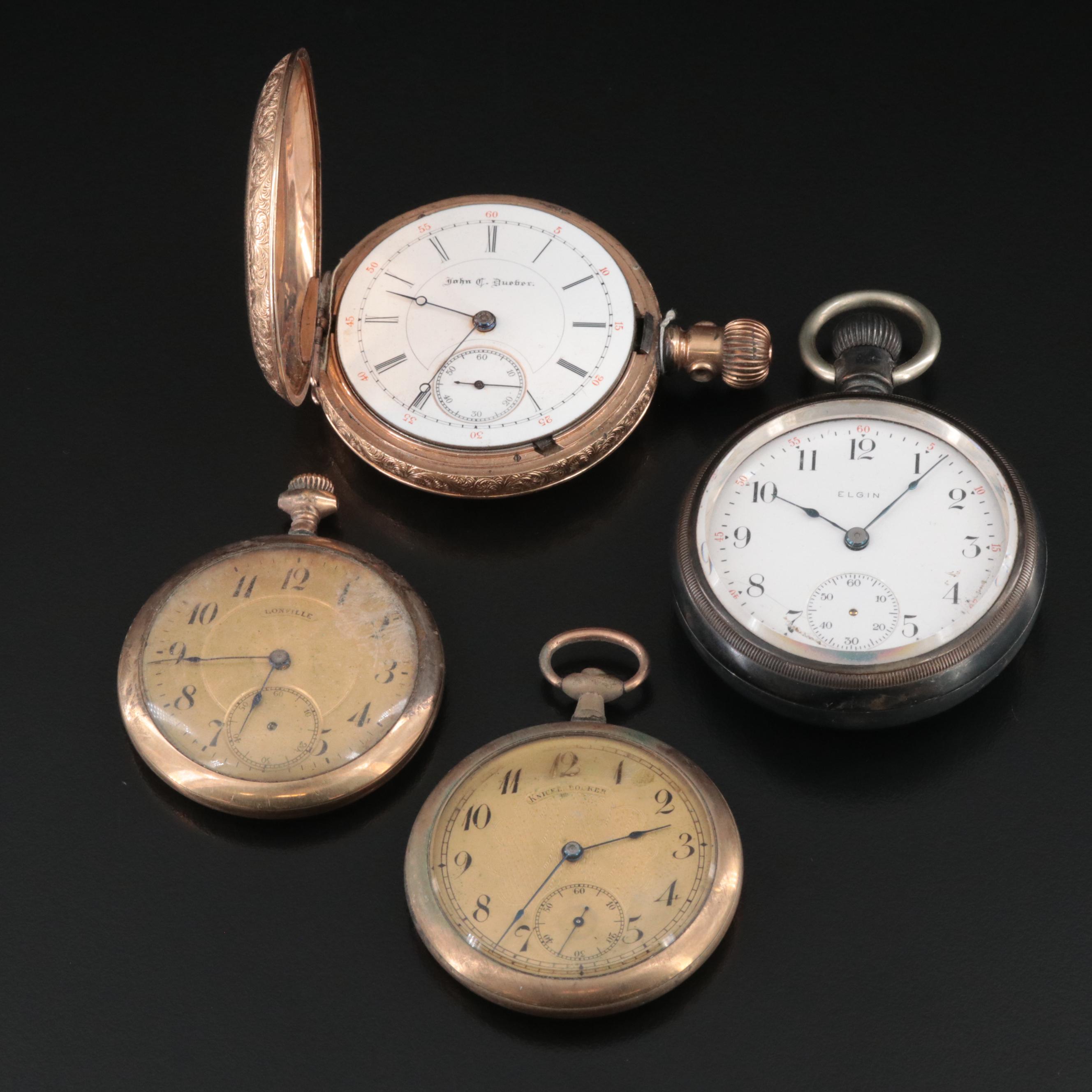 Collection of Antique Pocket Watches Featuring Elgin and Dueber