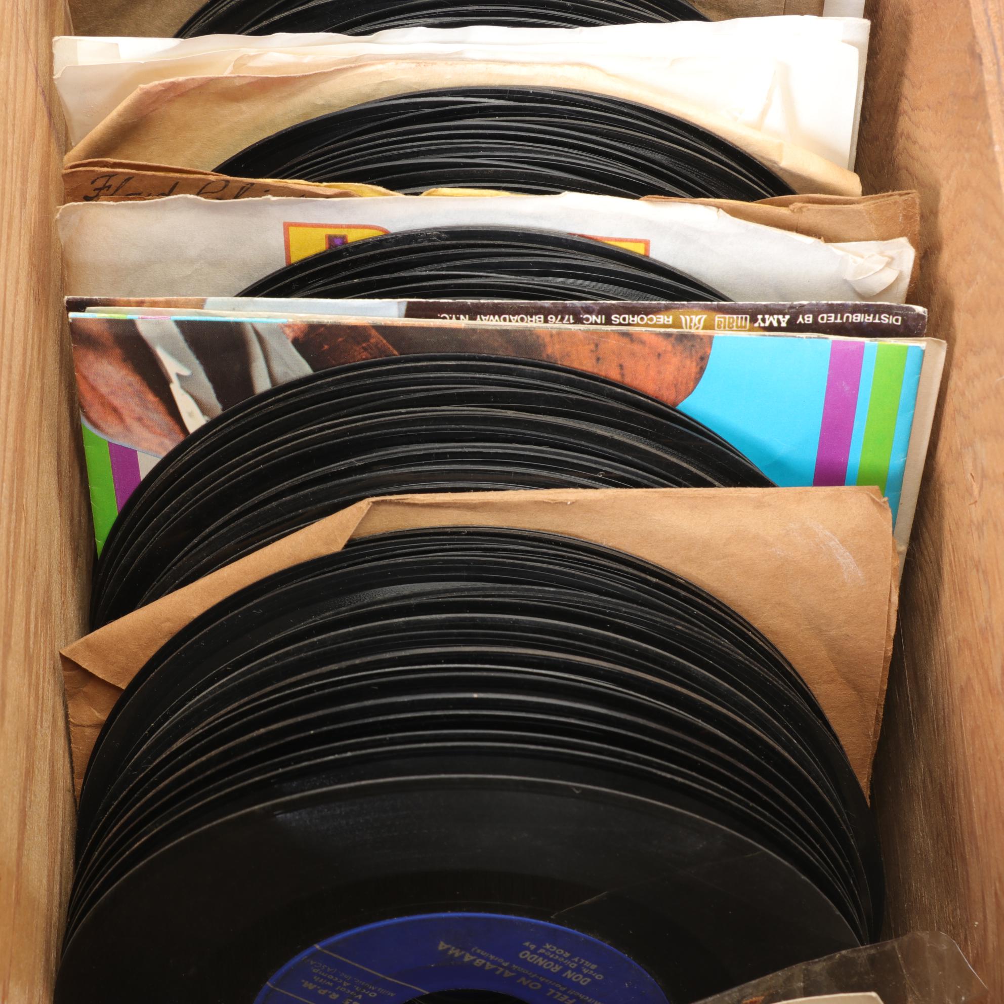 Elvis, The Rolling Stones, Diana Ross, and More 45 RPM Records
