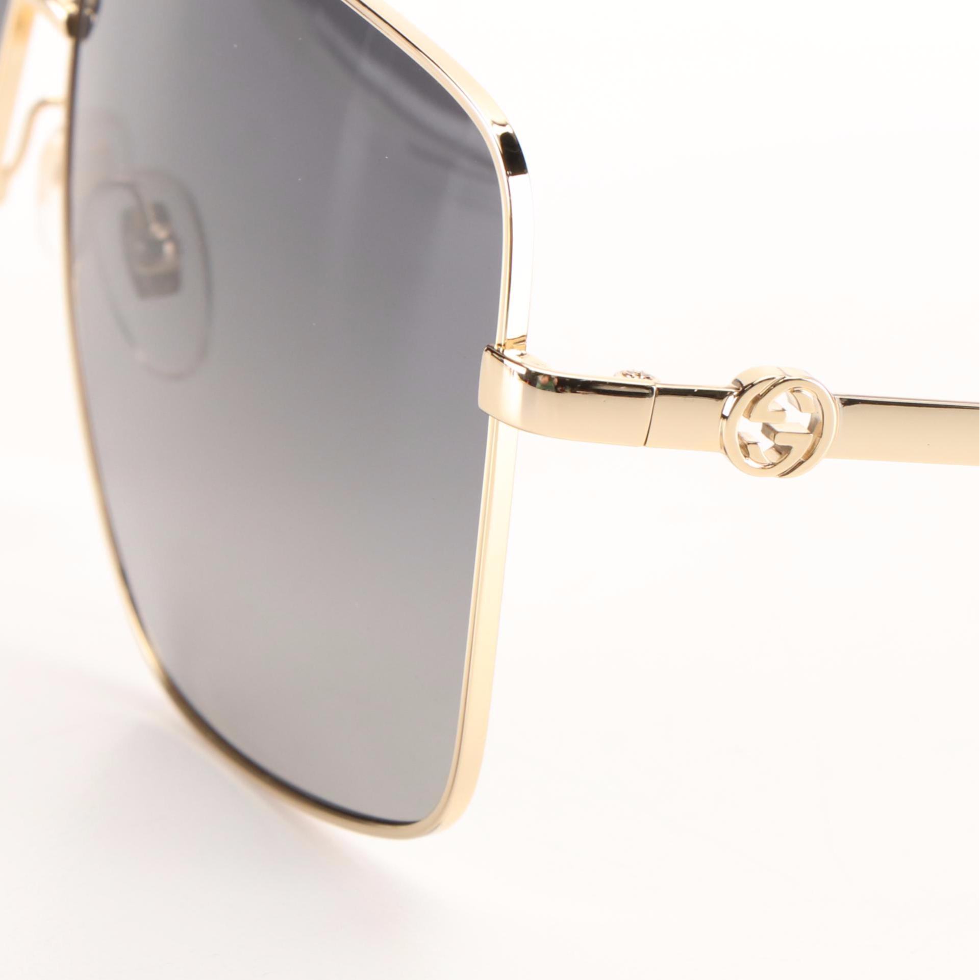 Gucci GG 1087S Aviator Sunglasses with  Gold Frames and Grey Lenses