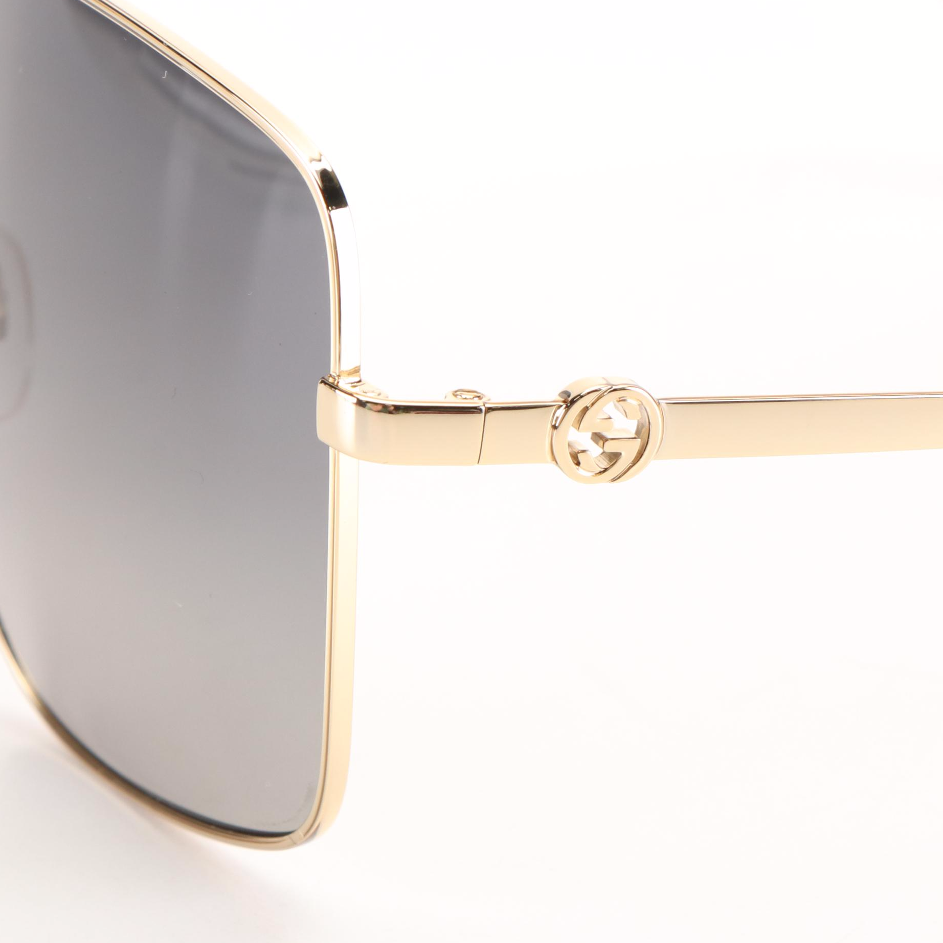 Gucci GG 1087S Aviator Sunglasses with Gold Frames and Grey Lenses