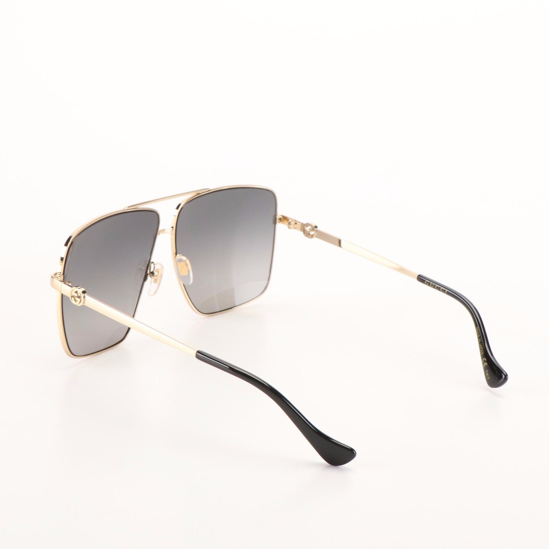 Gucci GG 1087S Aviator Sunglasses with Gold Frames and Grey Lenses
