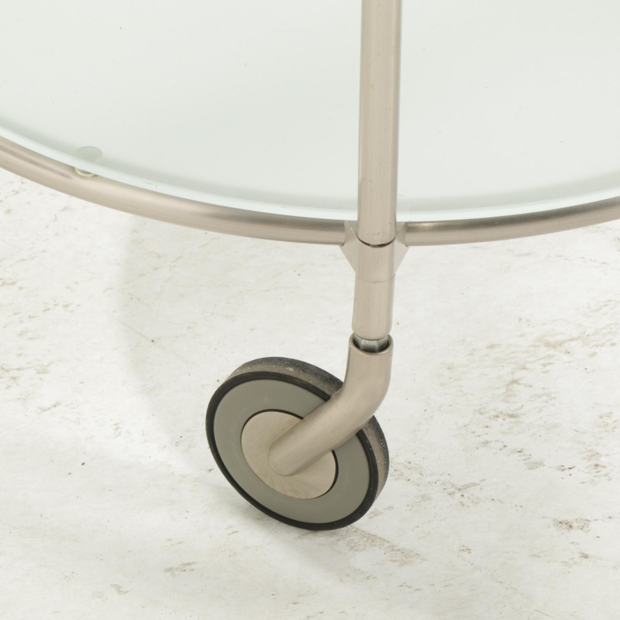 Pair of IKEA "Strind" Rolling Glass Top Side Tables, Early 21st Century