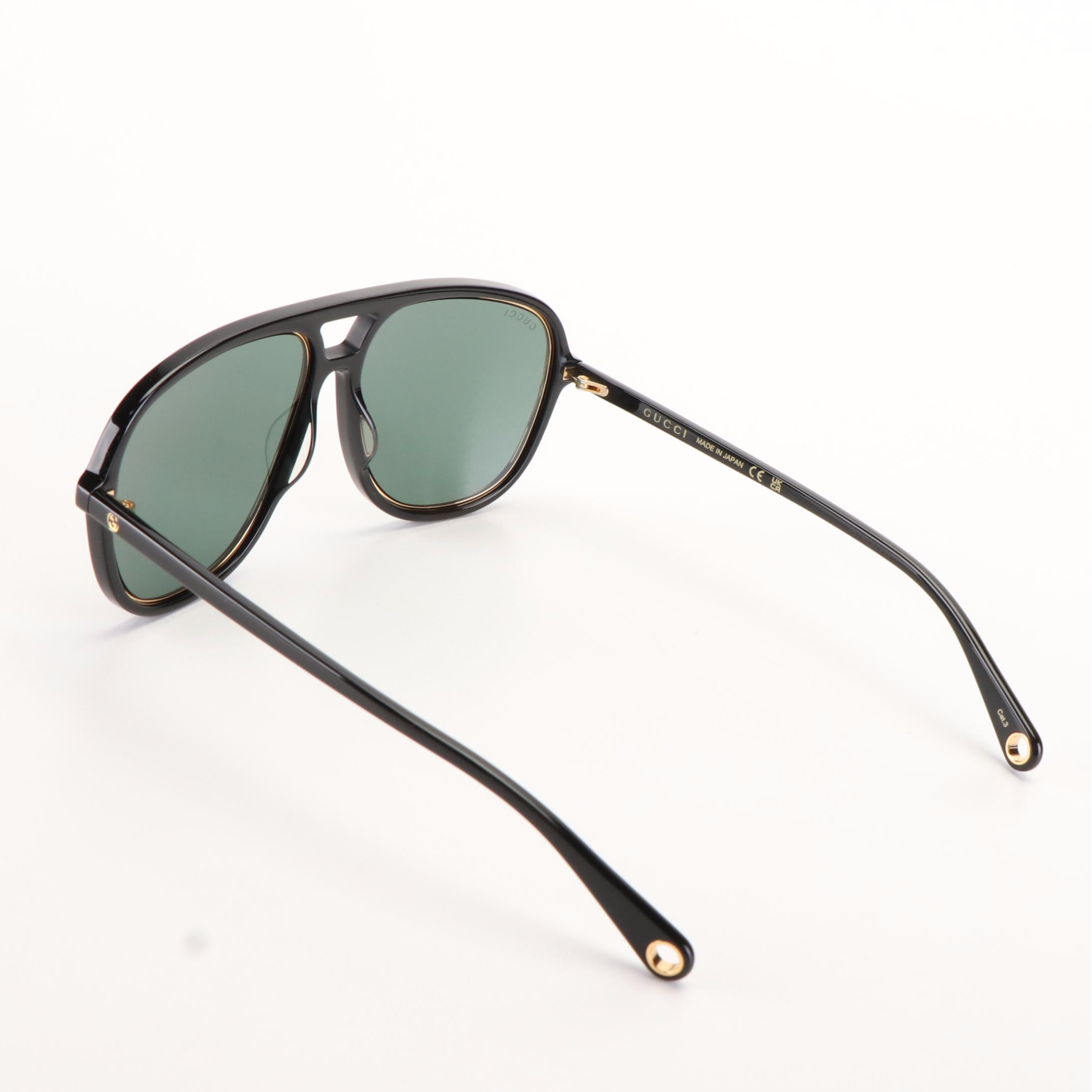 Gucci GG 1077S Black Frames and Green Lenses Aviator Sunglasses