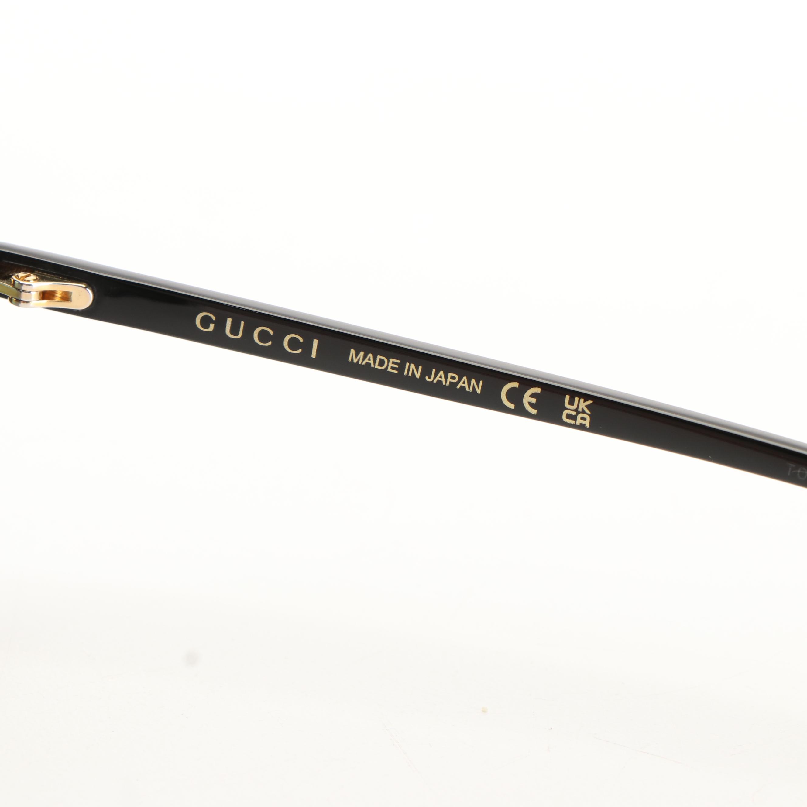 Gucci GG 1077S Black Frames and Green Lenses Aviator Sunglasses