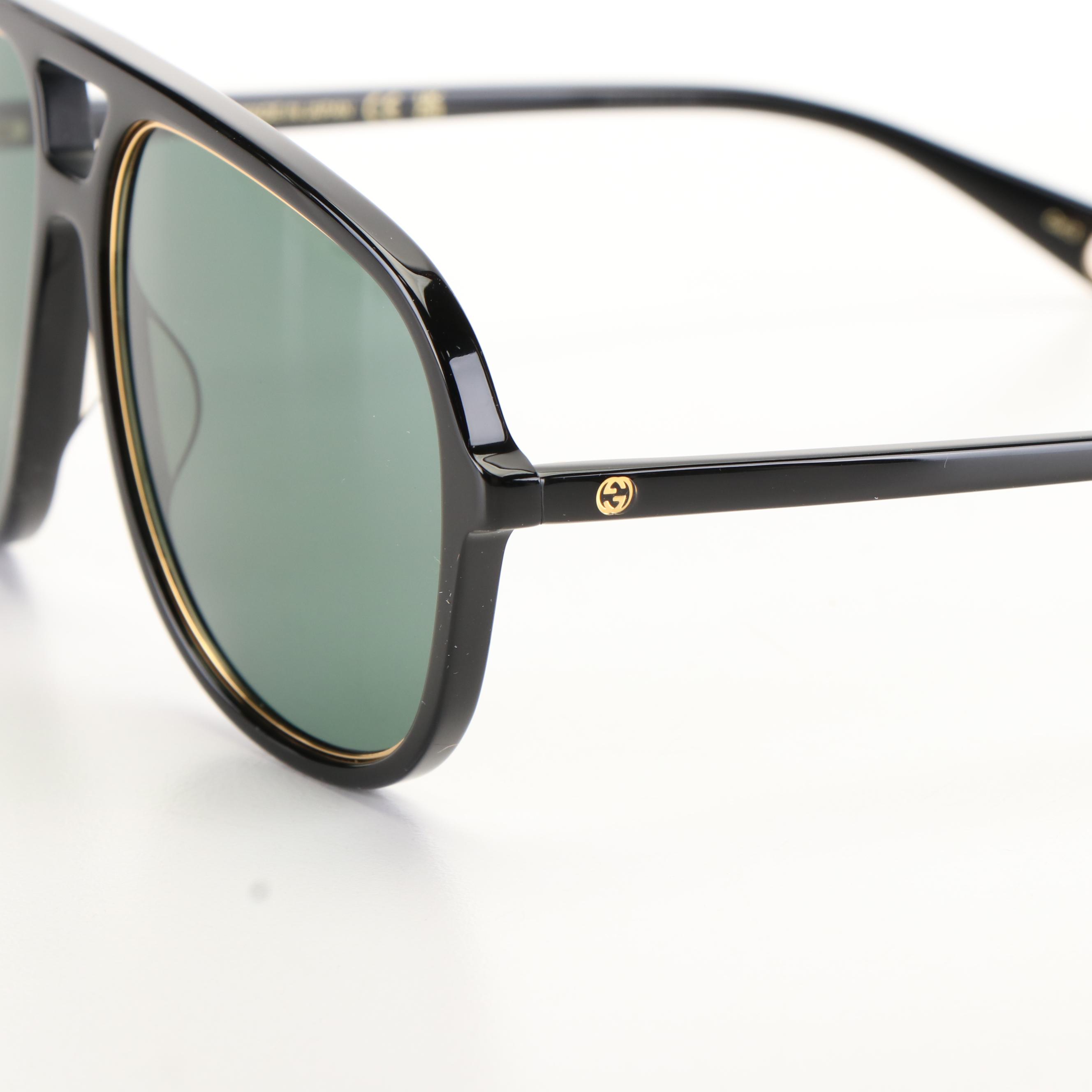 Gucci GG 1077S Black Frames and Green Lenses Aviator Sunglasses