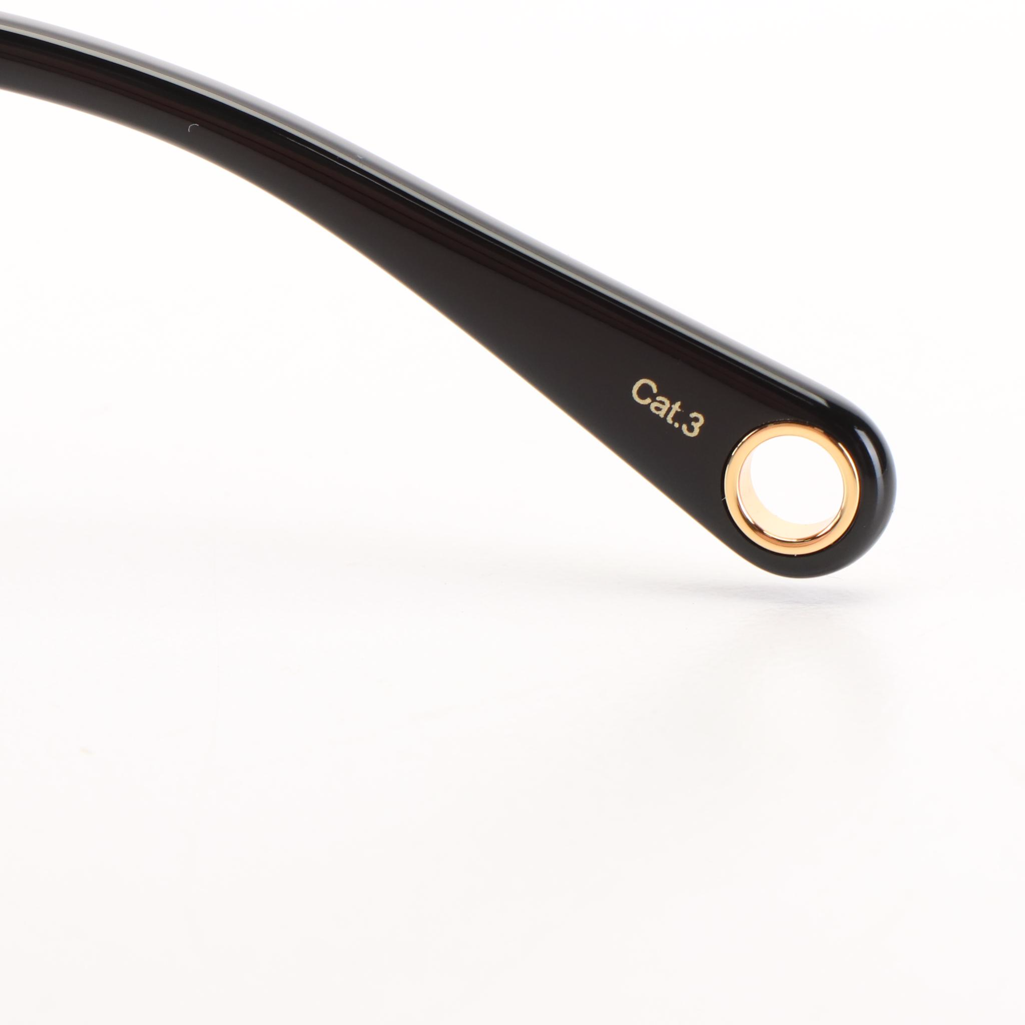 Gucci GG 1077S Aviator Sunglasses with Black Frames and Green Lenses