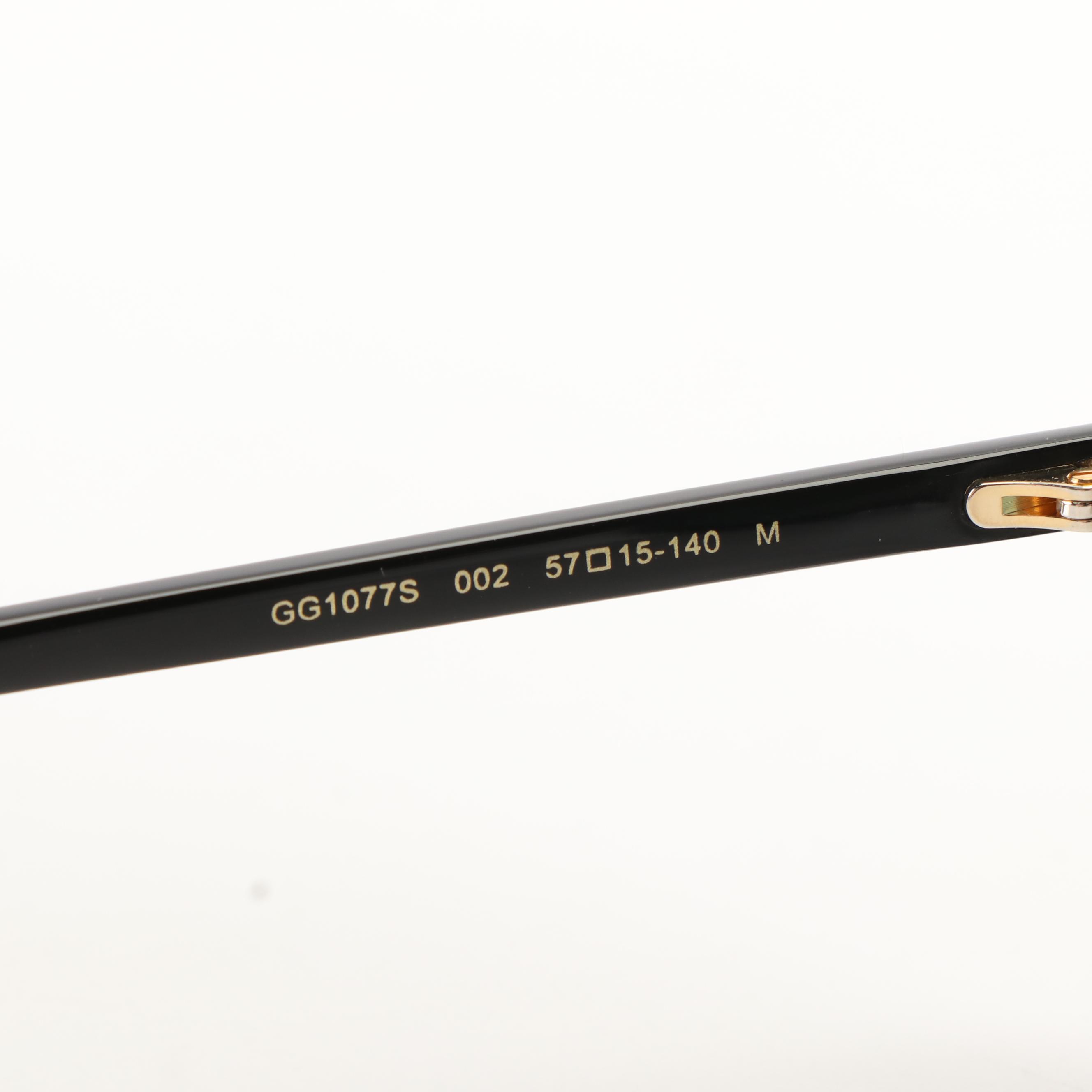 Gucci GG 1077S Aviator Sunglasses with Black Frames and Green Lenses