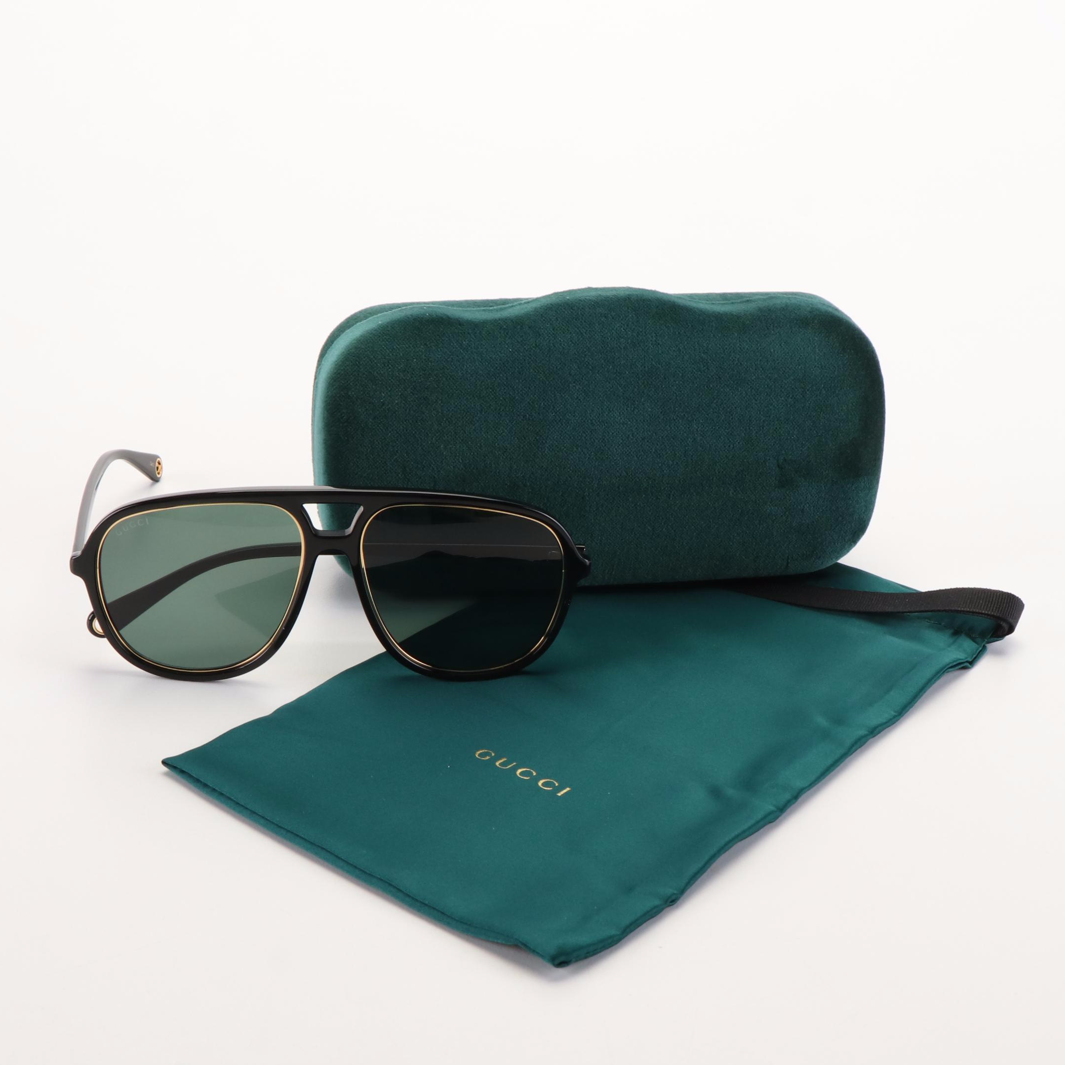 Gucci GG 1077S Aviator Sunglasses with Black Frames and Green Lenses