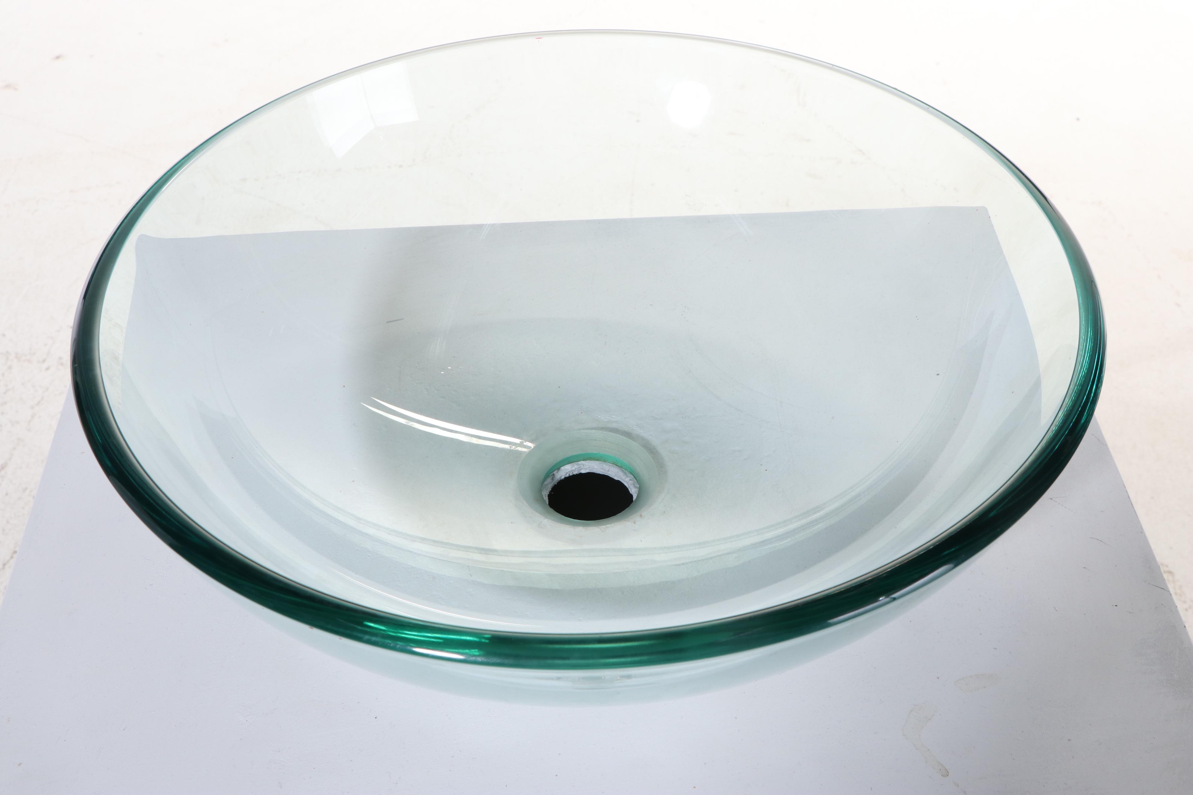 Bathroom Vanity with Glass Vessel Sink and MacKenzie-Childs Knobs and Towel