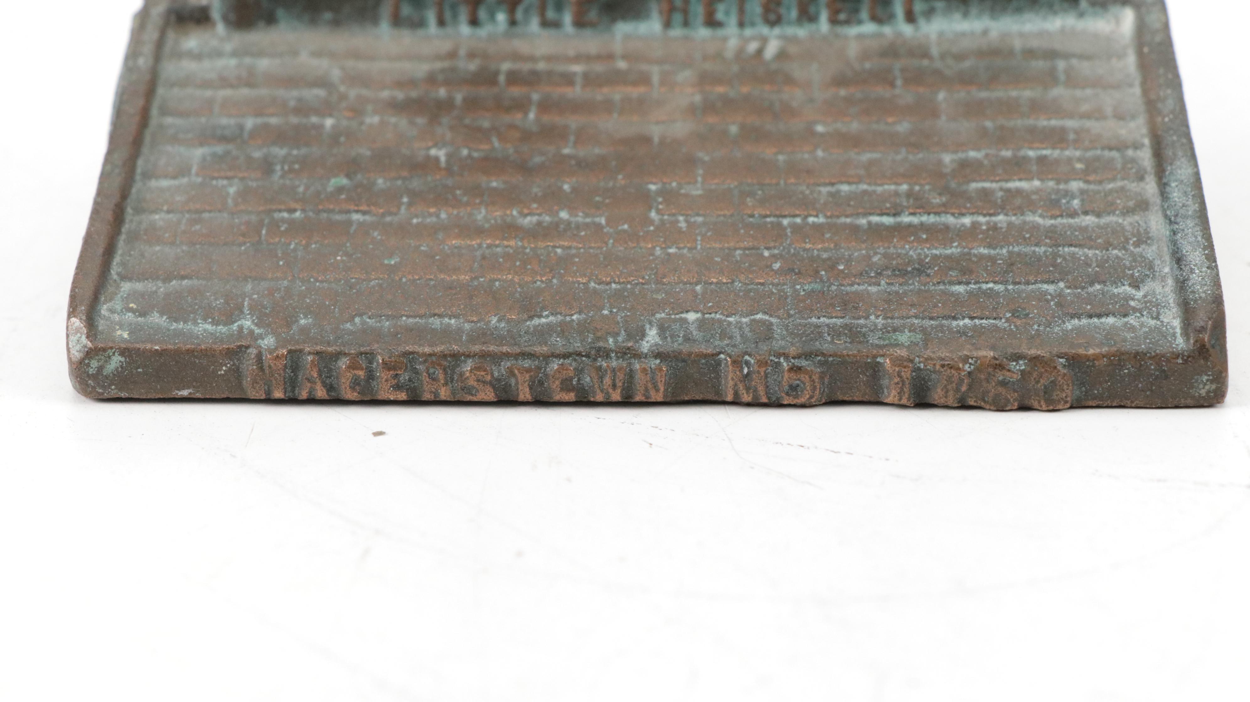 Cast Metal Little Heiskell Doorstop with Fort Snelling Figurine