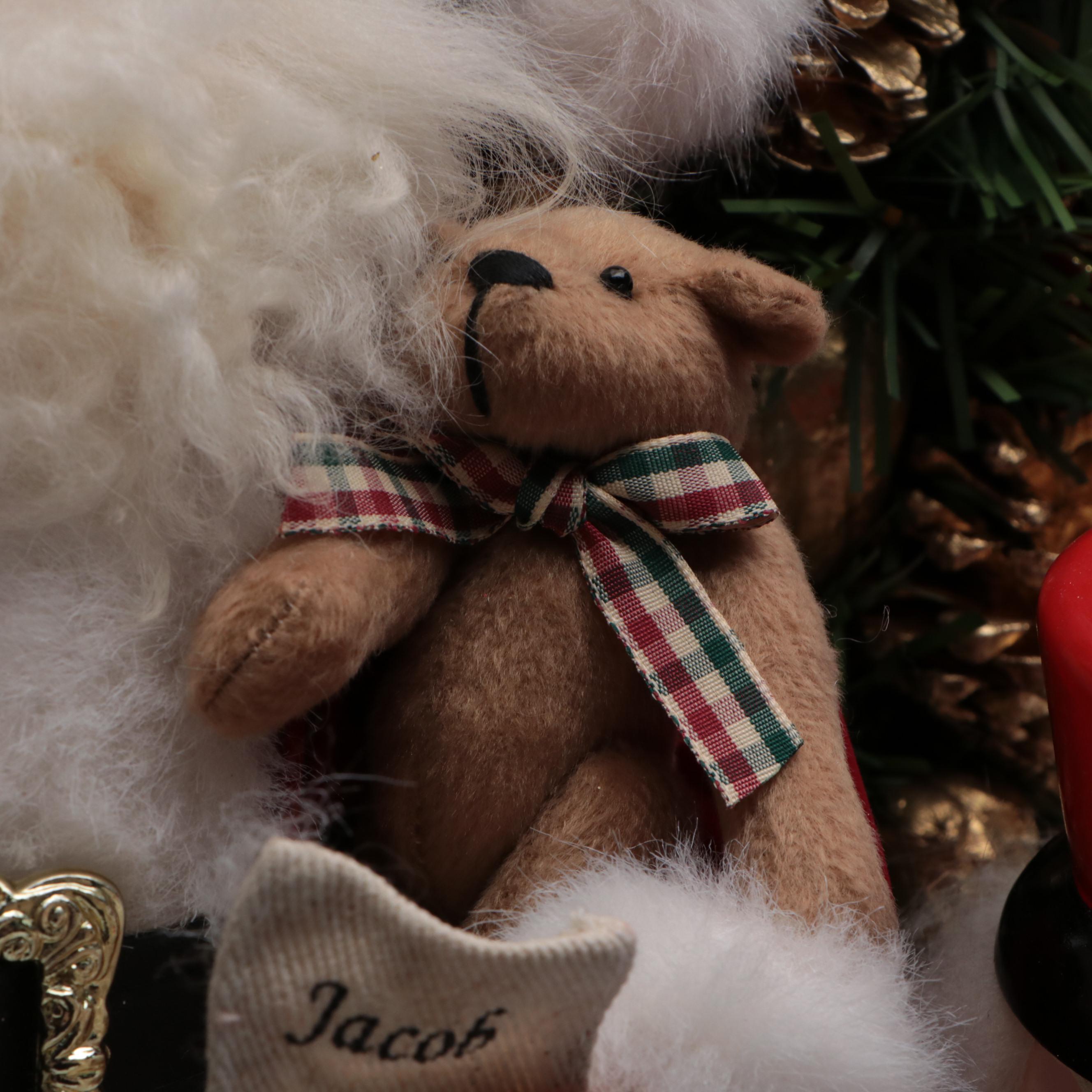 Wooden Nutcrackers with Santa Figurine and Artificial Greenery