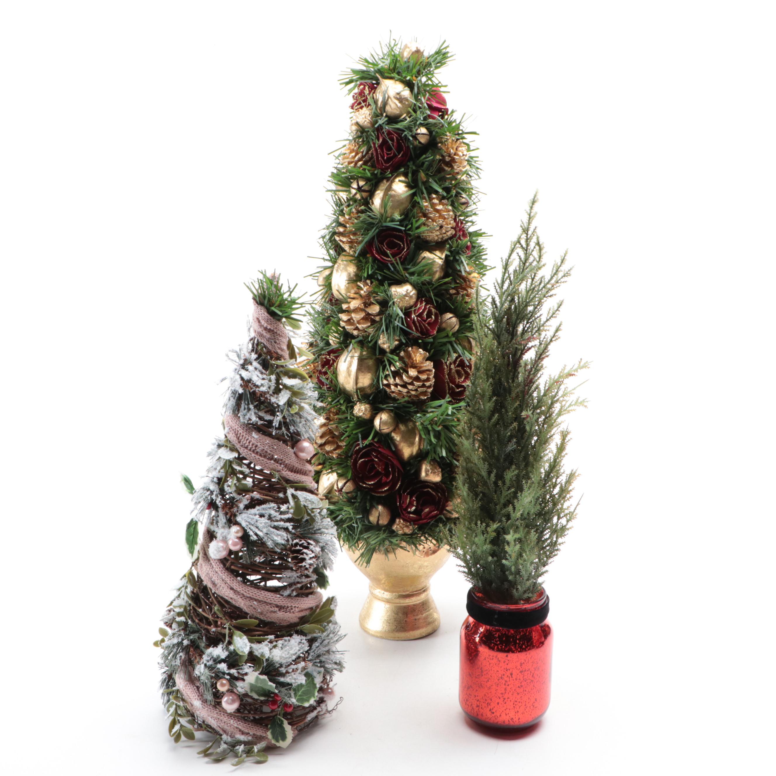 Wooden Nutcrackers with Santa Figurine and Artificial Greenery