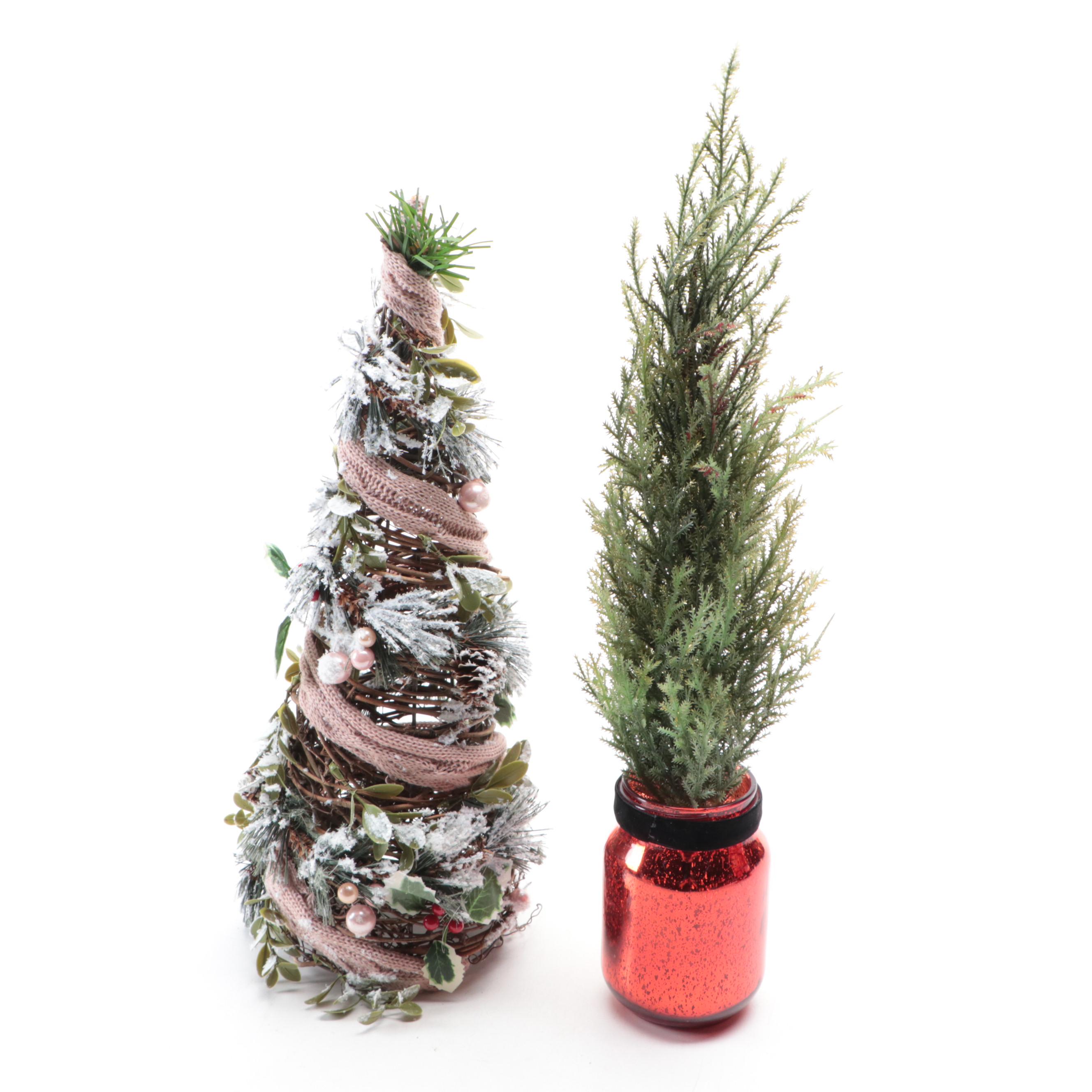 Wooden Nutcrackers with Santa Figurine and Artificial Greenery