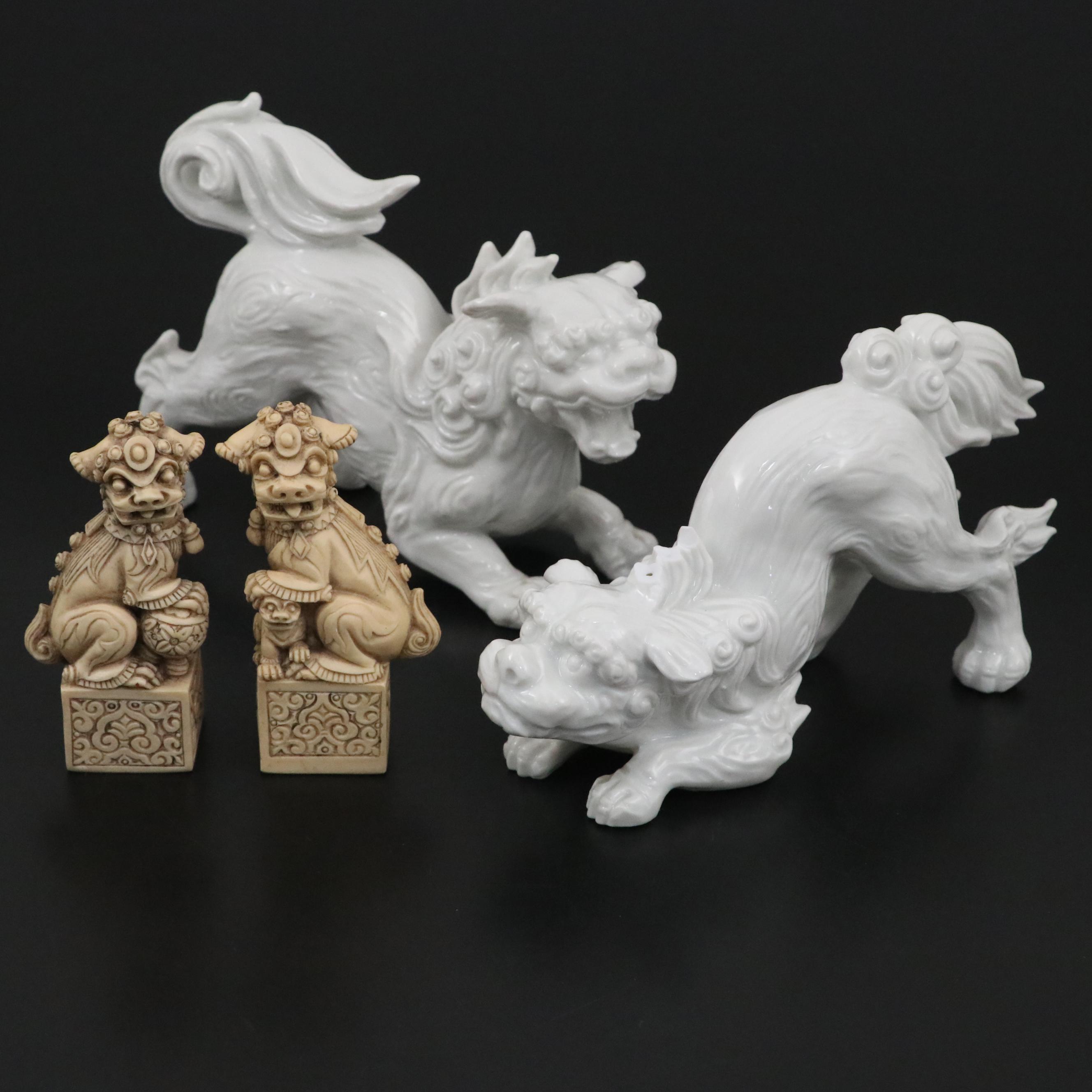 Chinese Blanc de Chine and Resin Guardian Lion Figurine Pairs