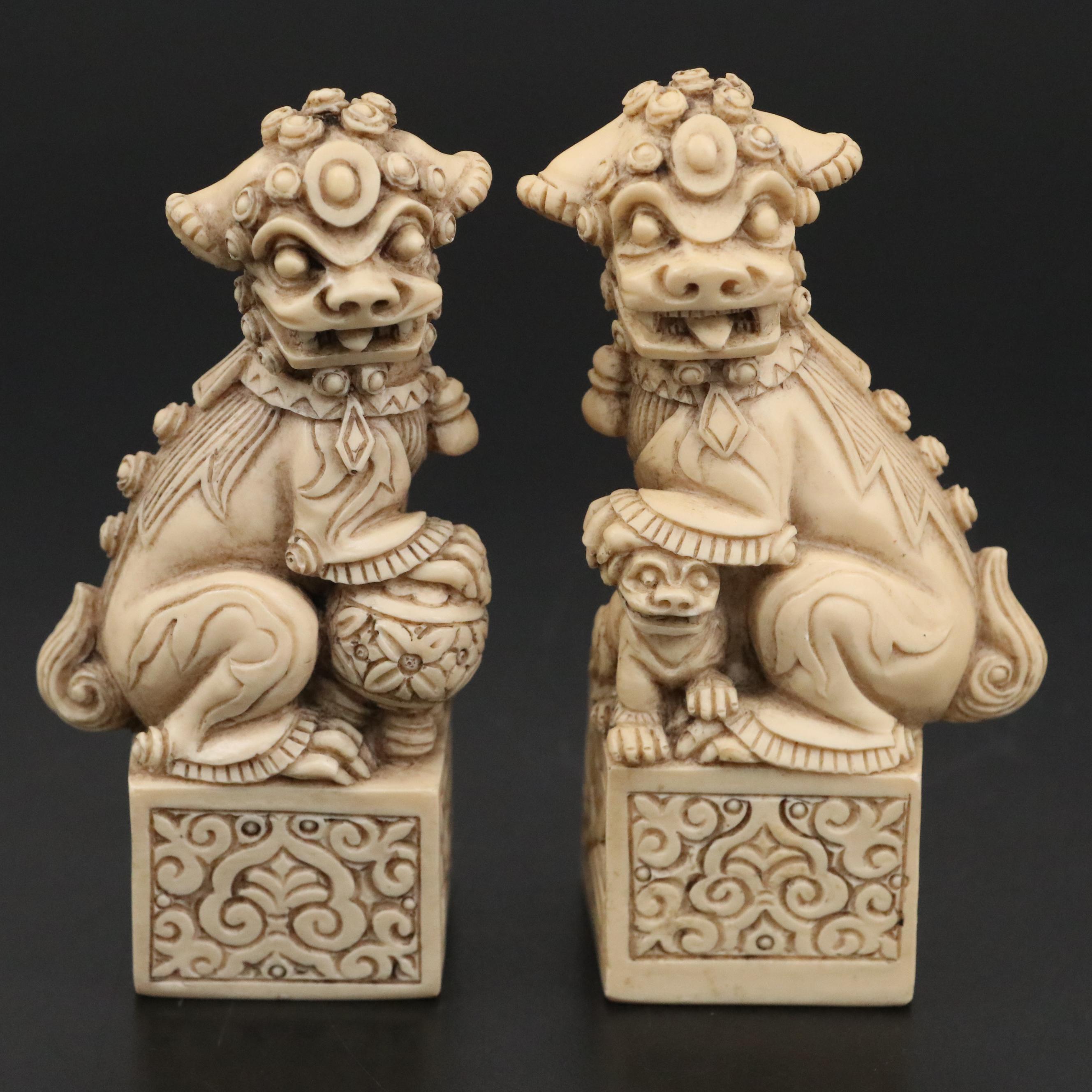 Chinese Blanc de Chine and Resin Guardian Lion Figurine Pairs