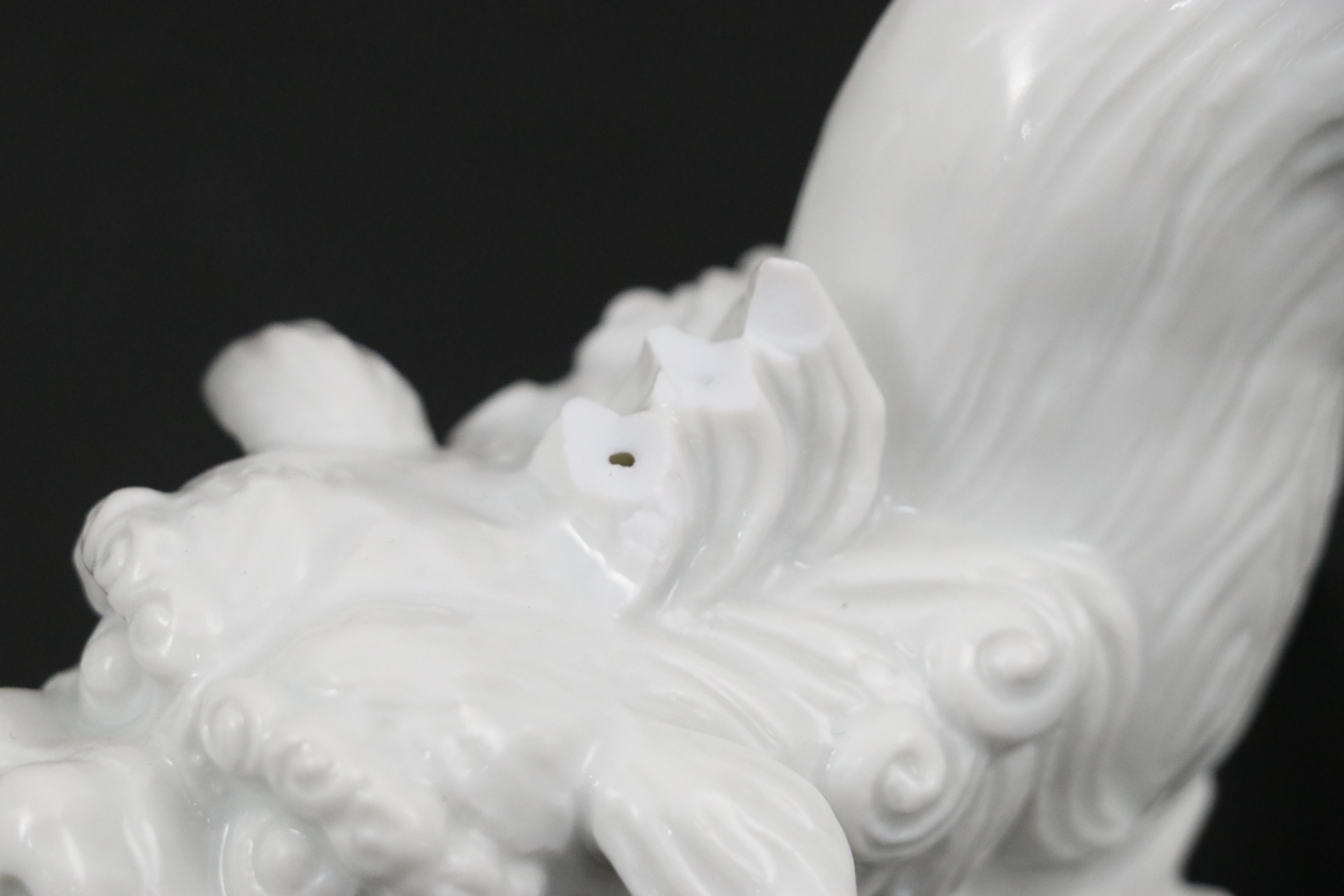 Chinese Blanc de Chine and Resin Guardian Lion Figurine Pairs