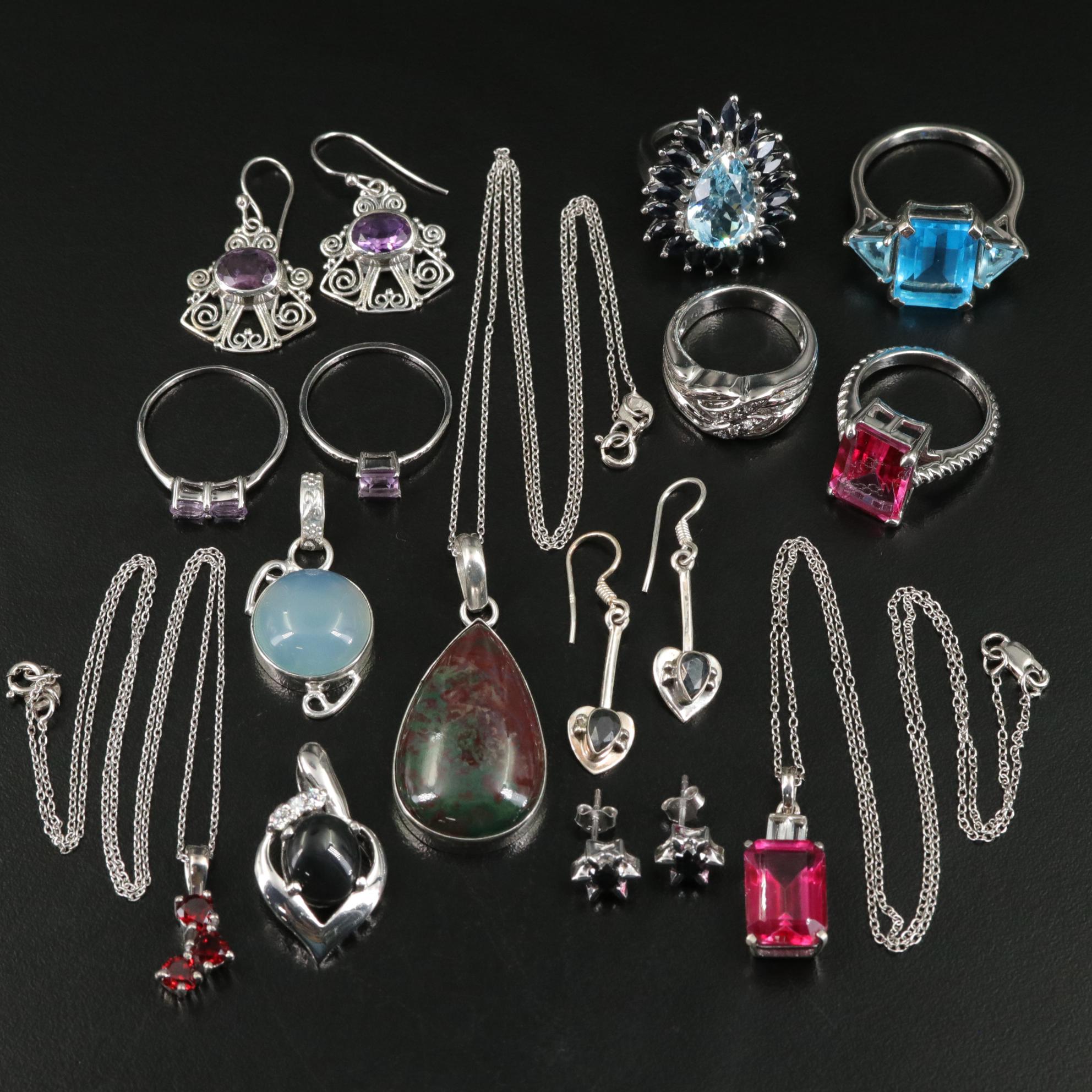 Group of 14 Assorted Sterling Silver Rings, Necklaces, Earrings, and Pendants