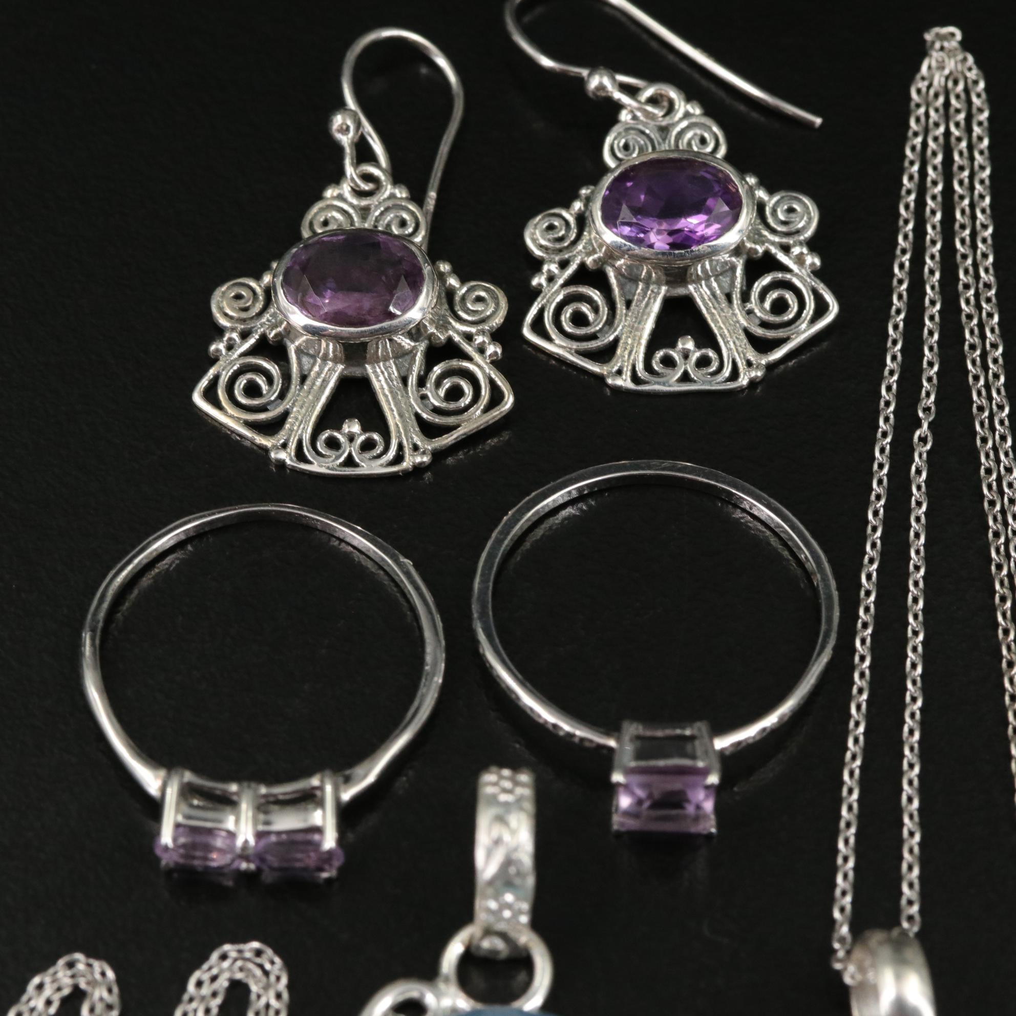 Group of 14 Assorted Sterling Silver Rings, Necklaces, Earrings, and Pendants