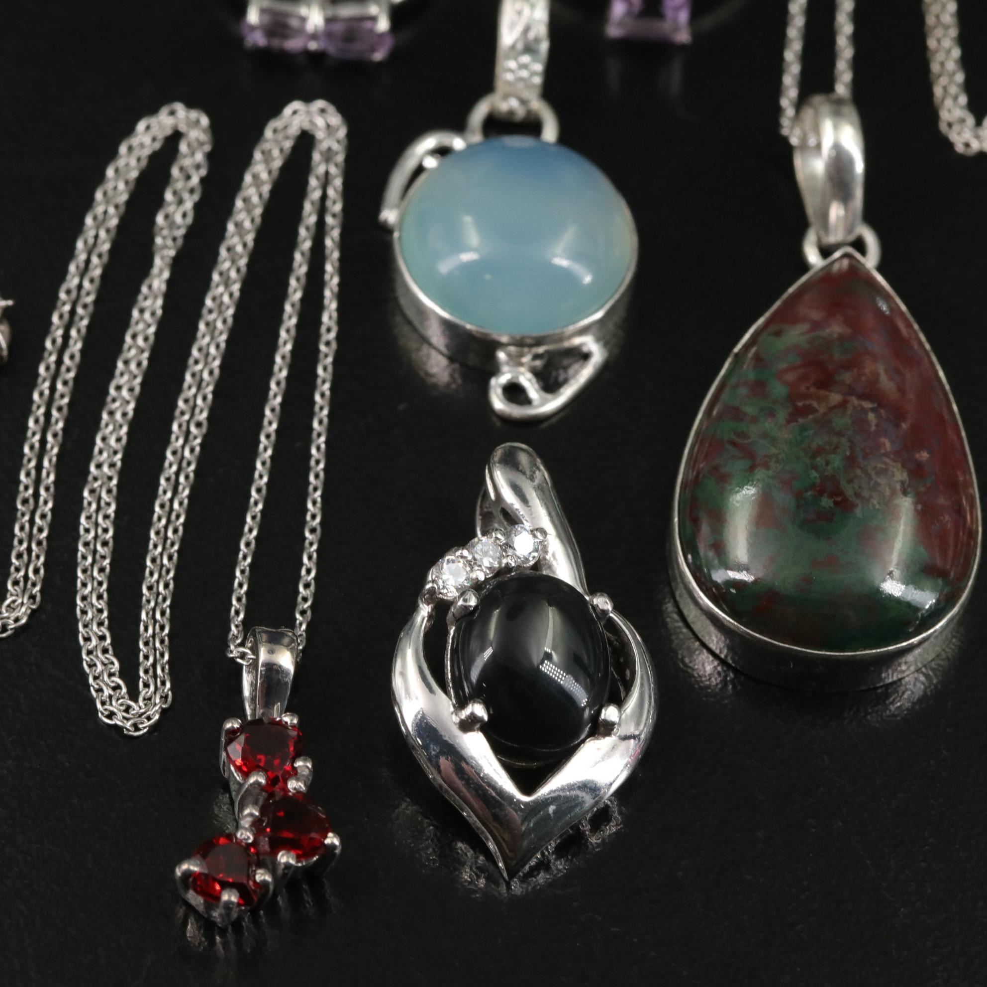 Group of 14 Assorted Sterling Silver Rings, Necklaces, Earrings, and Pendants