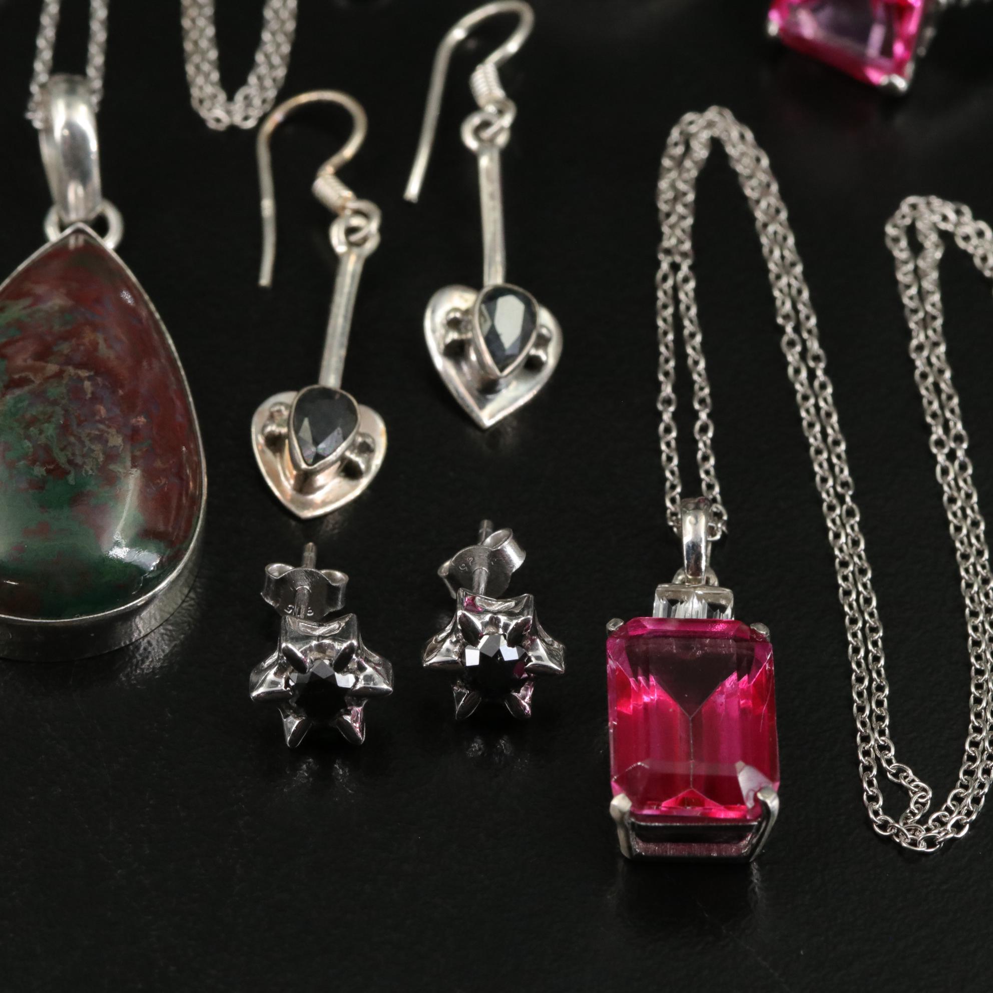 Group of 14 Assorted Sterling Silver Rings, Necklaces, Earrings, and Pendants