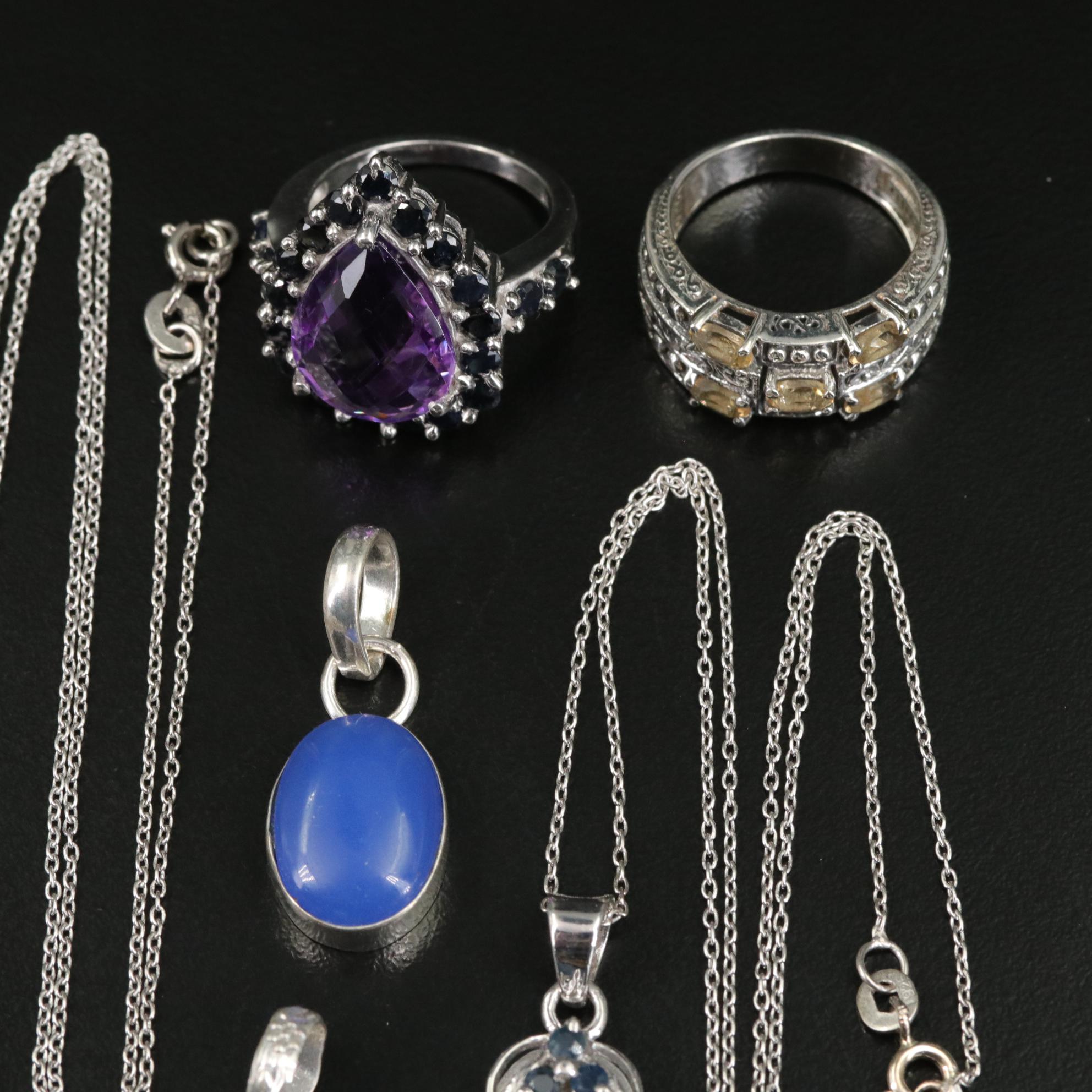 Group of 14 Assorted Sterling Silver Rings, Necklaces, Earrings, and Pendants